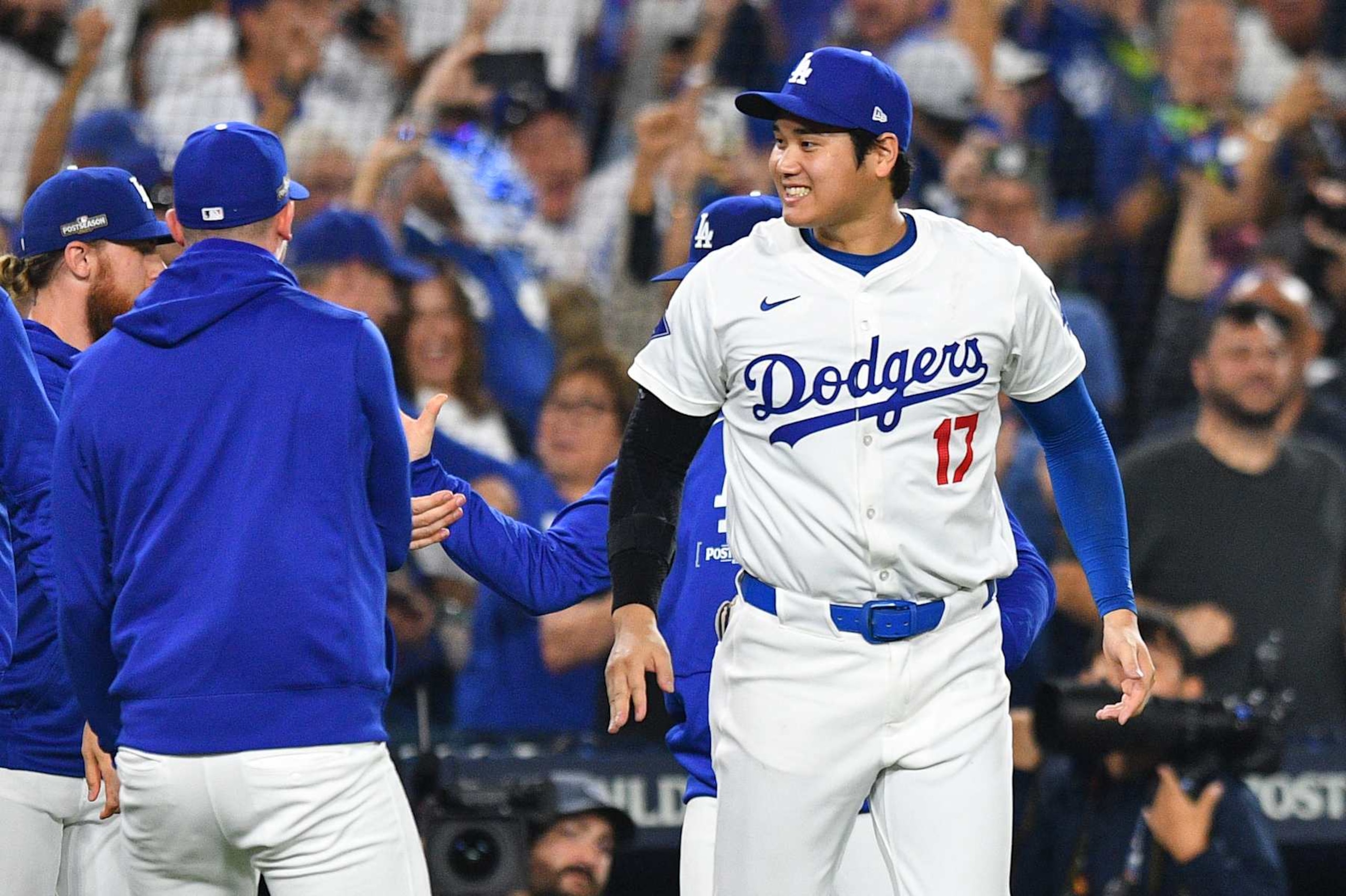 LOS ANGELES, CA - OCTOBER 11: Los Angeles Dodgers designated hitter Shohei Ohtani (17) celebrates after the final out of game five of the National League Division Series game between the San Diego Padres and the Los Angeles Dodgers on October 11, 2024 at Dodger Stadium in Los Angeles, CA. (Photo by Brian Rothmuller/Icon Sportswire via Getty Images) LOS ANGELES, CA - OCTOBER 11: Los Angeles Dodgers designated hitter Shohei Ohtani (17) celebrates after the final out of game five of the National League Division Series game between the San Diego Padres and the Los Angeles Dodgers on October 11, 2024 at Dodger Stadium in Los Angeles, CA. (Photo by Brian Rothmuller/Icon Sportswire via Getty Images)