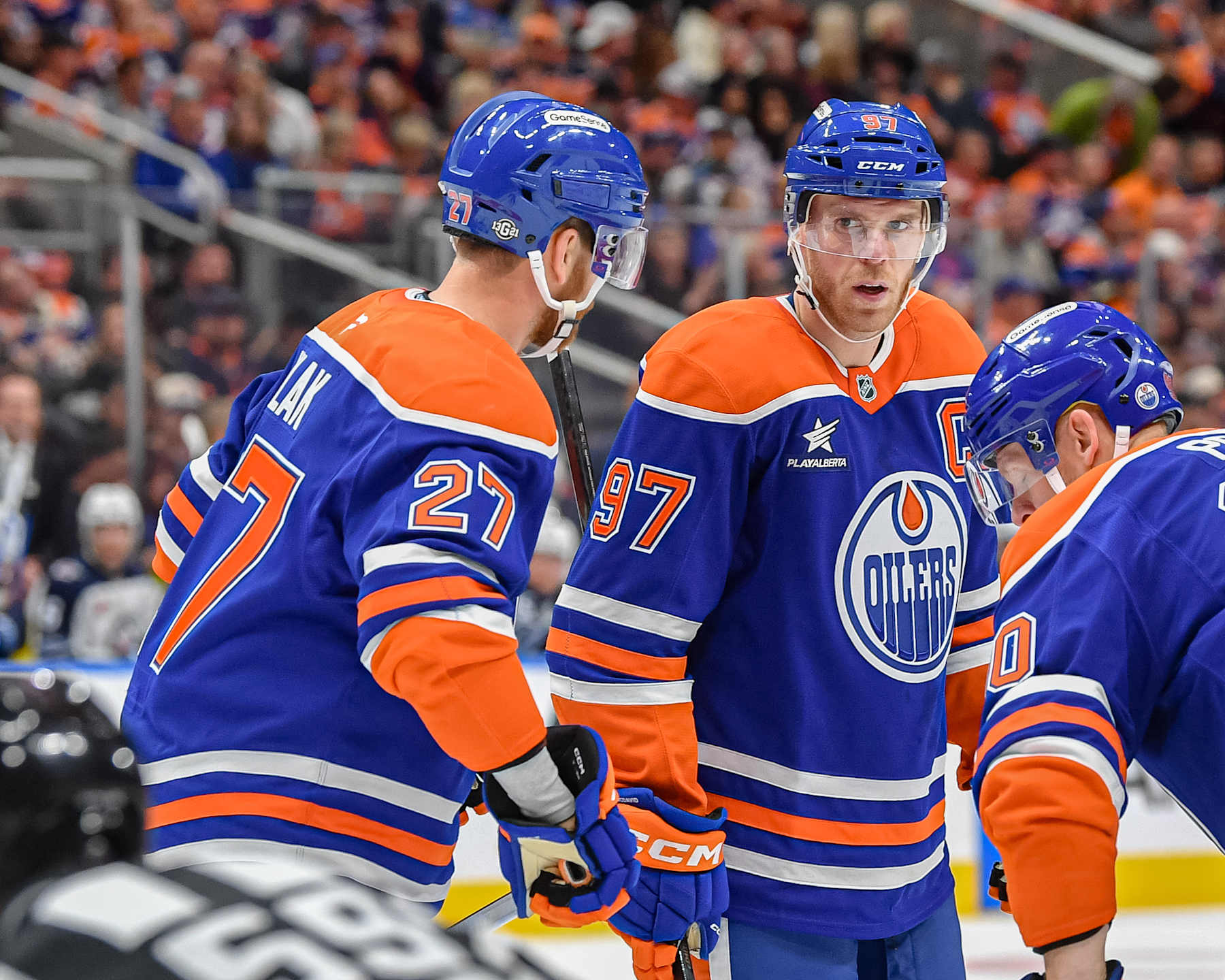 EDMONTON, CANADA - OCTOBER 9: Connor McDavid #97 and Brett Kulak #27 of the Edmonton Oilers discuss the play during the second period of the game against the Winnipeg Jets at Rogers Place on October 9, 2024, in Edmonton, Alberta, Canada. (Photo by Andy Devlin/NHLI via Getty Images)