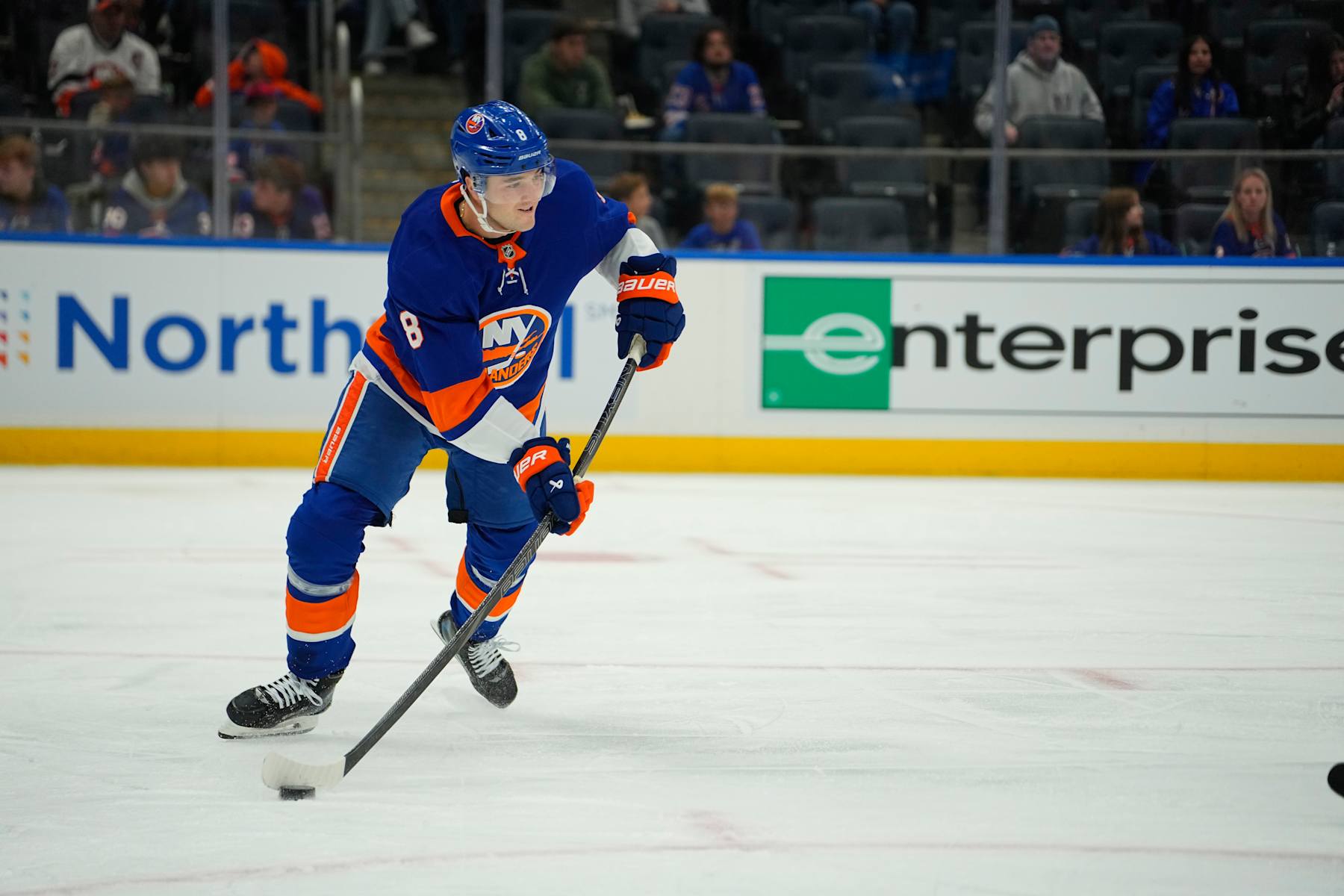 ELMONT, NY - OCTOBER 04: New York Islanders Defenseman Noah Dobson (8) controls the puck during the first period of the National Hockey League game between the New York Rangers and the New York Islanders on September 4, 2024, at UBS Arena in Elmont, NY. (Photo by Gregory Fisher/Icon Sportswire via Getty Images)