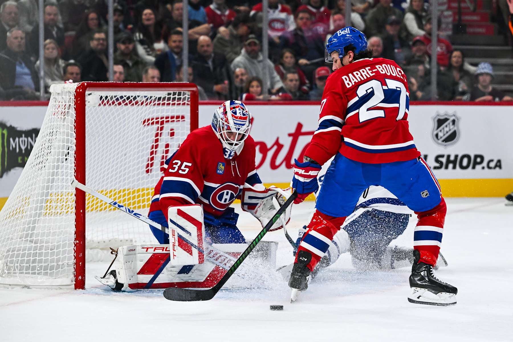 MONTREAL, QC - OCTOBER 09: Montreal Canadiens center Alex Barre-Boulet (27) defends in front of Montreal Canadiens goalie Sam Montembeault (35) during the Toronto Maple Leafs versus the Montreal Canadiens game on October 09, 2024, at Bell Centre in Montreal, QC (Photo by David Kirouac/Icon Sportswire via Getty Images)