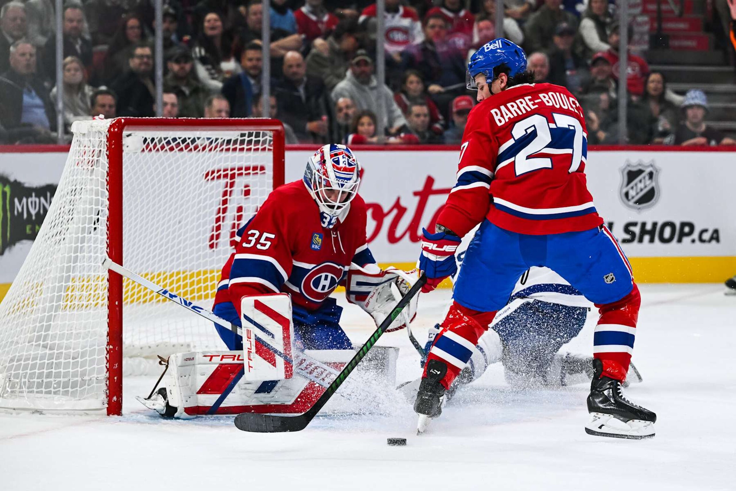 MONTREAL, QC - OCTOBER 09: Montreal Canadiens center Alex Barre-Boulet (27) defends in front of Montreal Canadiens goalie Sam Montembeault (35) during the Toronto Maple Leafs versus the Montreal Canadiens game on October 09, 2024, at Bell Centre in Montreal, QC (Photo by David Kirouac/Icon Sportswire via Getty Images)