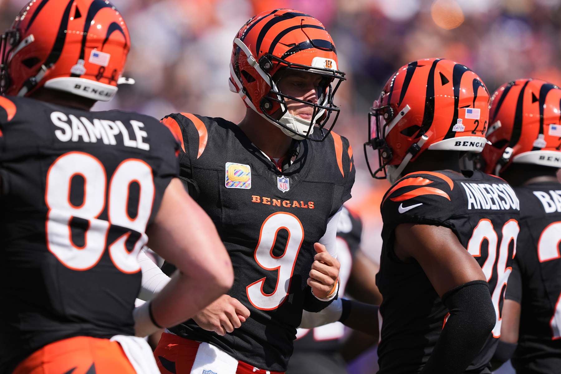 CINCINNATI, OHIO - OCTOBER 06: Joe Burrow #9 of the Cincinnati Bengals jogs across the field in the second quarter against the Baltimore Ravens at Paycor Stadium on October 06, 2024 in Cincinnati, Ohio. (Photo by Dylan Buell/Getty Images)