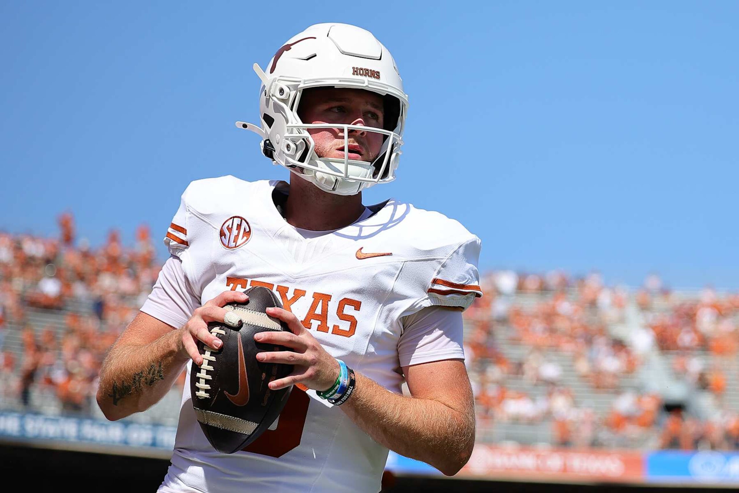 DALLAS, TEXAS - OCTOBER 12: Quinn Ewers #3 of the Texas Longhorns warms-up prior to a game against the Oklahoma Sooners at Cotton Bowl Stadium on October 12, 2024 in Dallas, Texas. (Photo by Alex Slitz/Getty Images)