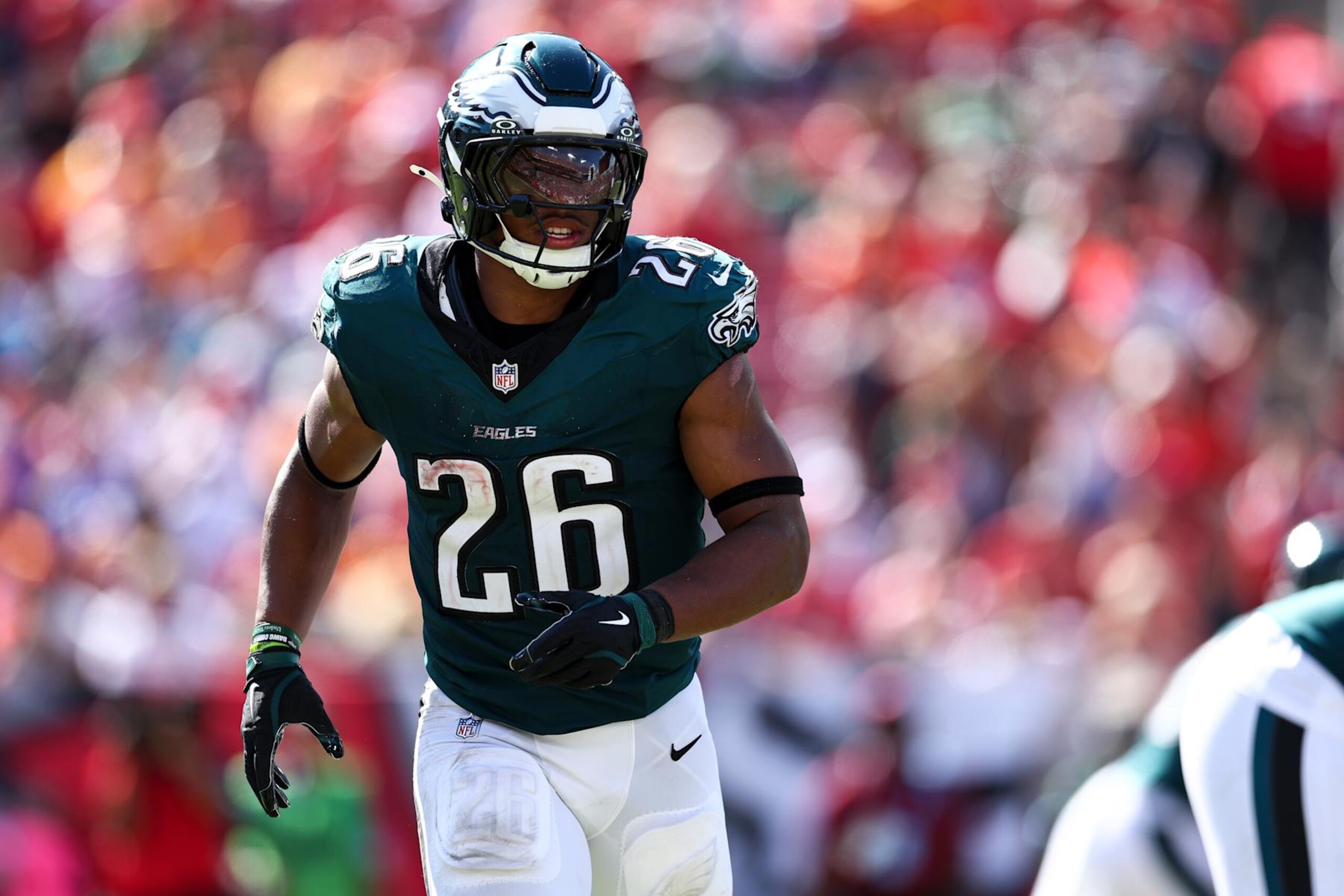 TAMPA, FL - SEPTEMBER 29: Saquon Barkley #26 of the Philadelphia Eagles motions before a play during the fourth quarter of an NFL football game against the Tampa Bay Buccaneers at Raymond James Stadium on September 29, 2024 in Tampa, Florida. (Photo by Kevin Sabitus/Getty Images)