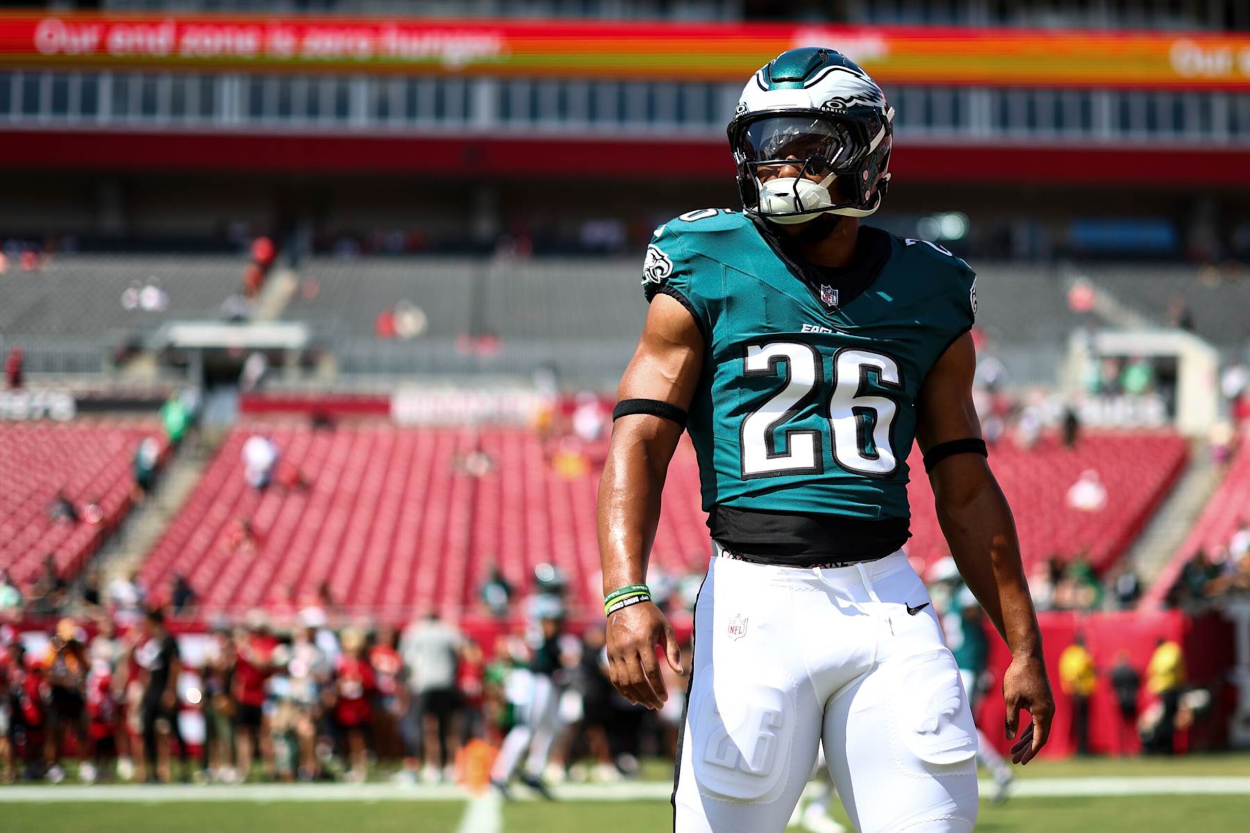 TAMPA, FL - SEPTEMBER 29: Saquon Barkley #26 of the Philadelphia Eagles warms up prior to an NFL football game against the Tampa Bay Buccaneers at Raymond James Stadium on September 29, 2024 in Tampa, Florida. (Photo by Kevin Sabitus/Getty Images)