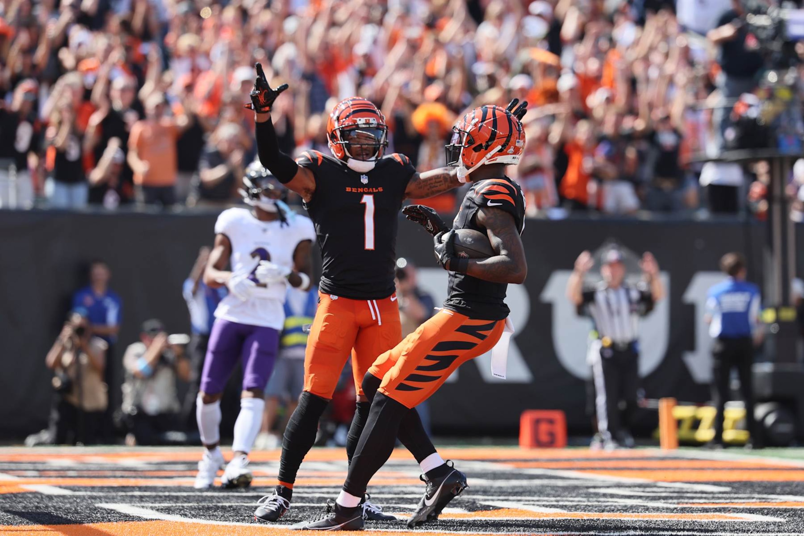 CINCINNATI, OHIO - OCTOBER 06: Tee Higgins #5 of the Cincinnati Bengals scores a touchdown against the Baltimore Ravens during the second quarter at Paycor Stadium on October 06, 2024 in Cincinnati, Ohio. (Photo by Andy Lyons/Getty Images)