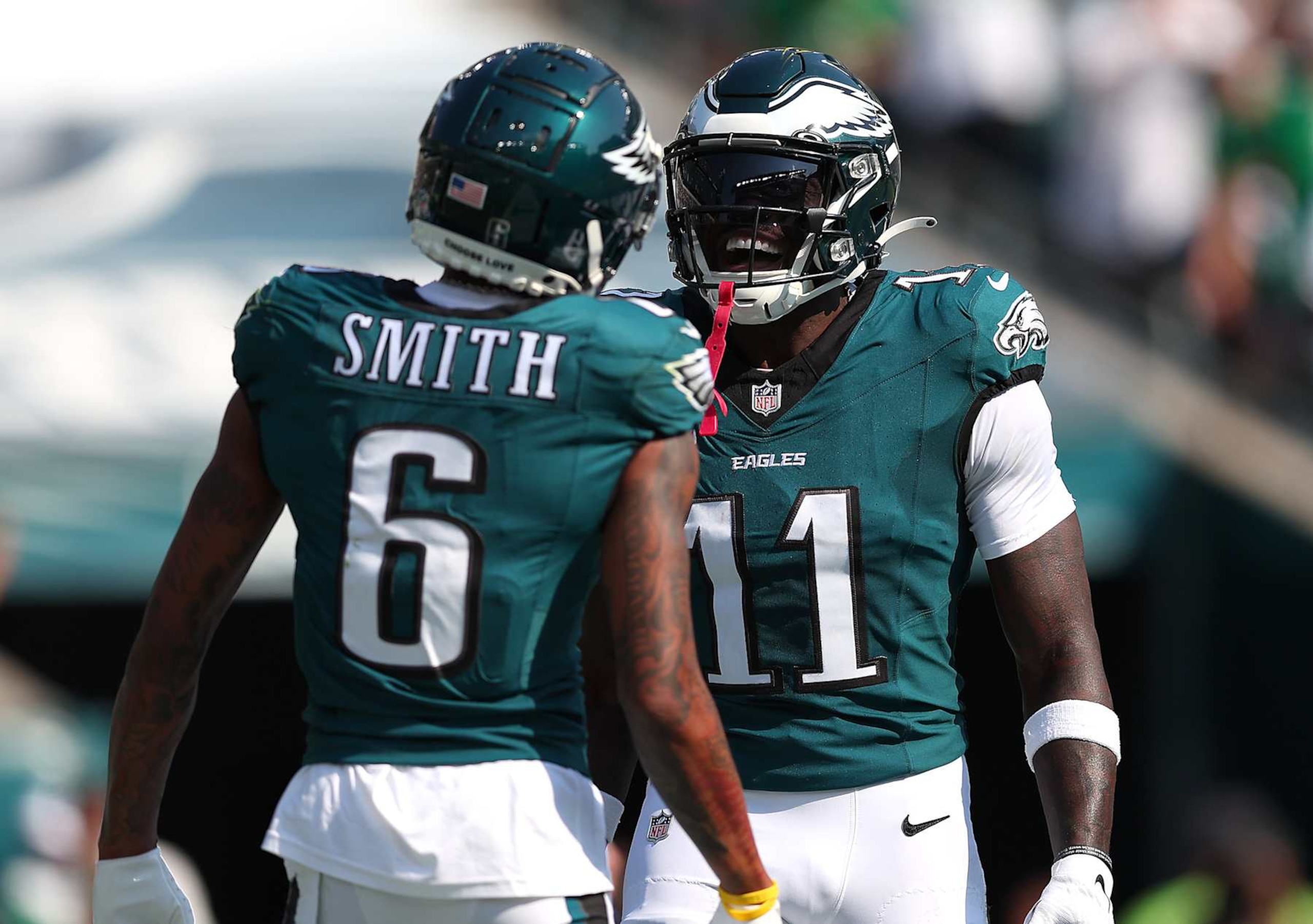 PHILADELPHIA, PENNSYLVANIA - OCTOBER 13: A.J. Brown #11 of the Philadelphia Eagles celebrates scoring a touchdown with teammate DeVonta Smith #6 during the second quarter against the Cleveland Browns at Lincoln Financial Field on October 13, 2024 in Philadelphia, Pennsylvania. (Photo by Heather Barry/Getty Images)
