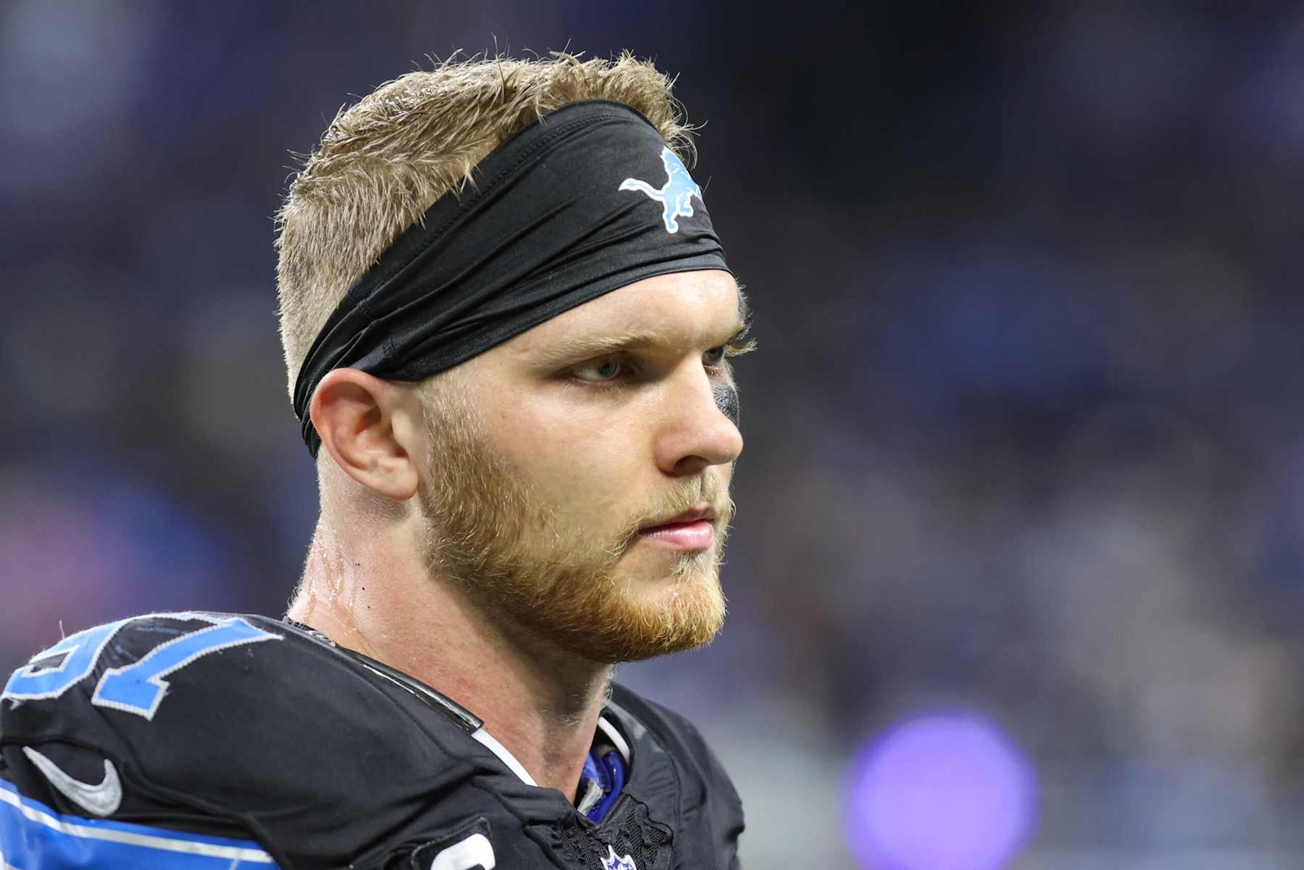 DETROIT, MI - SEPTEMBER 30:  Detroit Lions defensive end Aidan Hutchinson (97) looks on from the sideline during the third quarter of an NFL Monday Night Football regular season football game between the Seattle Seahawks and the Detroit Lions on September 30, 2024 at Ford Field in Detroit, Michigan. (Photo by Scott W. Grau/Icon Sportswire via Getty Images)