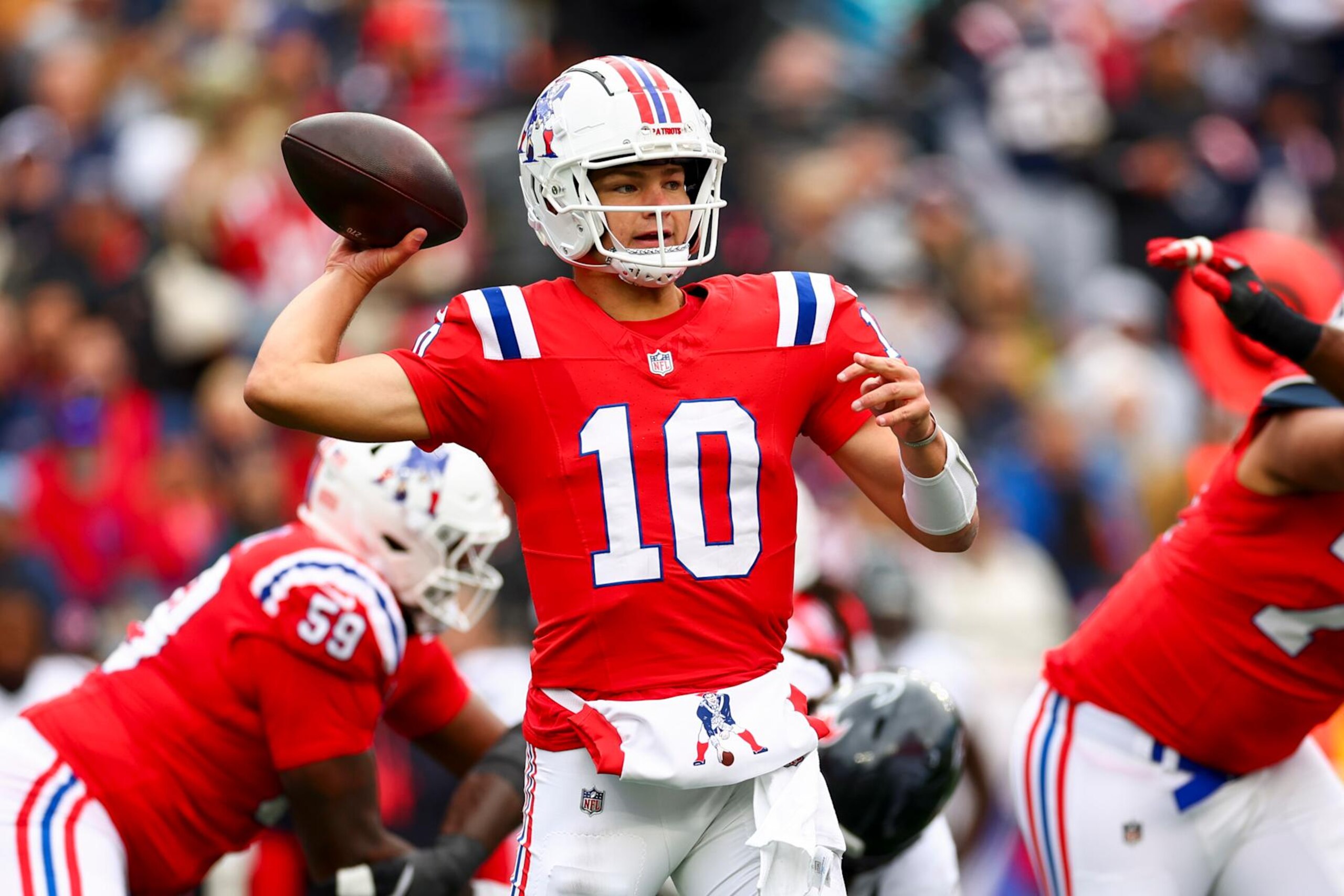 FOXBOROUGH, MASSACHUSETTS - OCTOBER 13: Drake Maye #10 of the New England Patriots throws a pass in his first NFL start against the Houston Texans during the first half at Gillette Stadium on October 13, 2024 in Foxborough, Massachusetts. (Photo by Maddie Meyer/Getty Images)