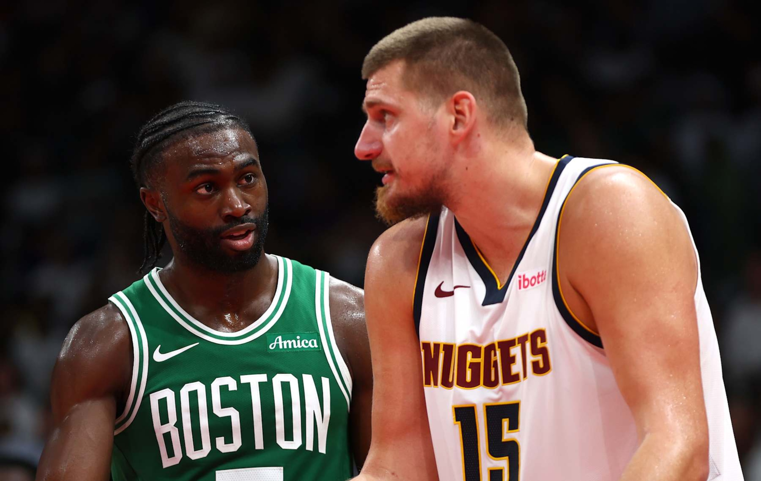 ABU DHABI, UNITED ARAB EMIRATES - OCTOBER 06: Jaylen Brown of Boston Celtics speaks to Nikola Jokic of Denver Nuggets during the NBA match between Boston Celtics and Denver Nuggets at Etihad Arena on October 06, 2024 in Abu Dhabi, United Arab Emirates. (Photo by Francois Nel/Getty Images) ABU DHABI, UNITED ARAB EMIRATES - OCTOBER 06: Jaylen Brown of Boston Celtics speaks to Nikola Jokic of Denver Nuggets during the NBA match between Boston Celtics and Denver Nuggets at Etihad Arena on October 06, 2024 in Abu Dhabi, United Arab Emirates. (Photo by Francois Nel/Getty Images)
