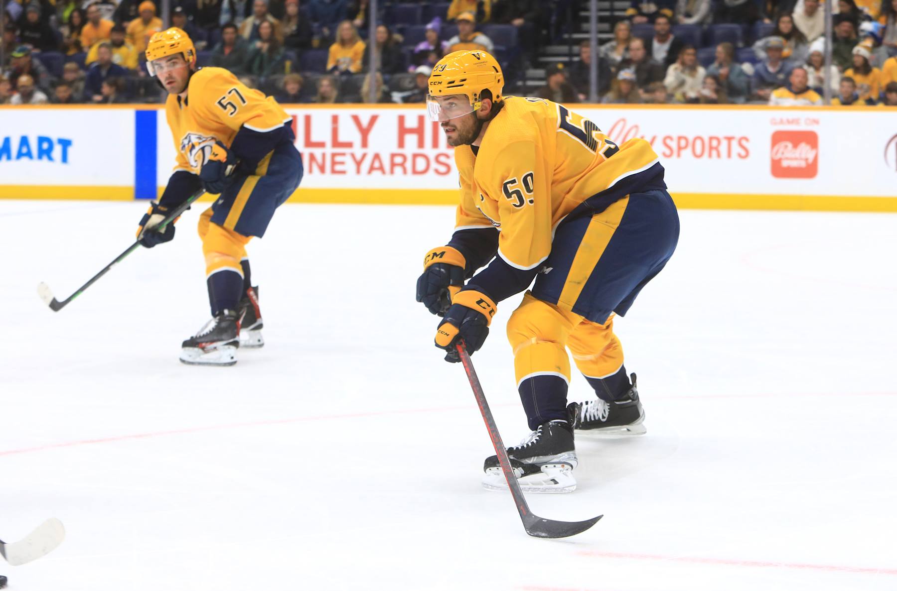 NASHVILLE, TN - FEBRUARY 12: Nashville Predators defenseman Roman Josi (59), of Switzerland, and defenseman Dante Fabbro (57) are shown during the NHL game between the Nashville Predators and Winnipeg Jets, held on February 12, 2022, at Bridgestone Arena in Nashville, Tennessee. (Photo by Danny Murphy/Icon Sportswire via Getty Images)