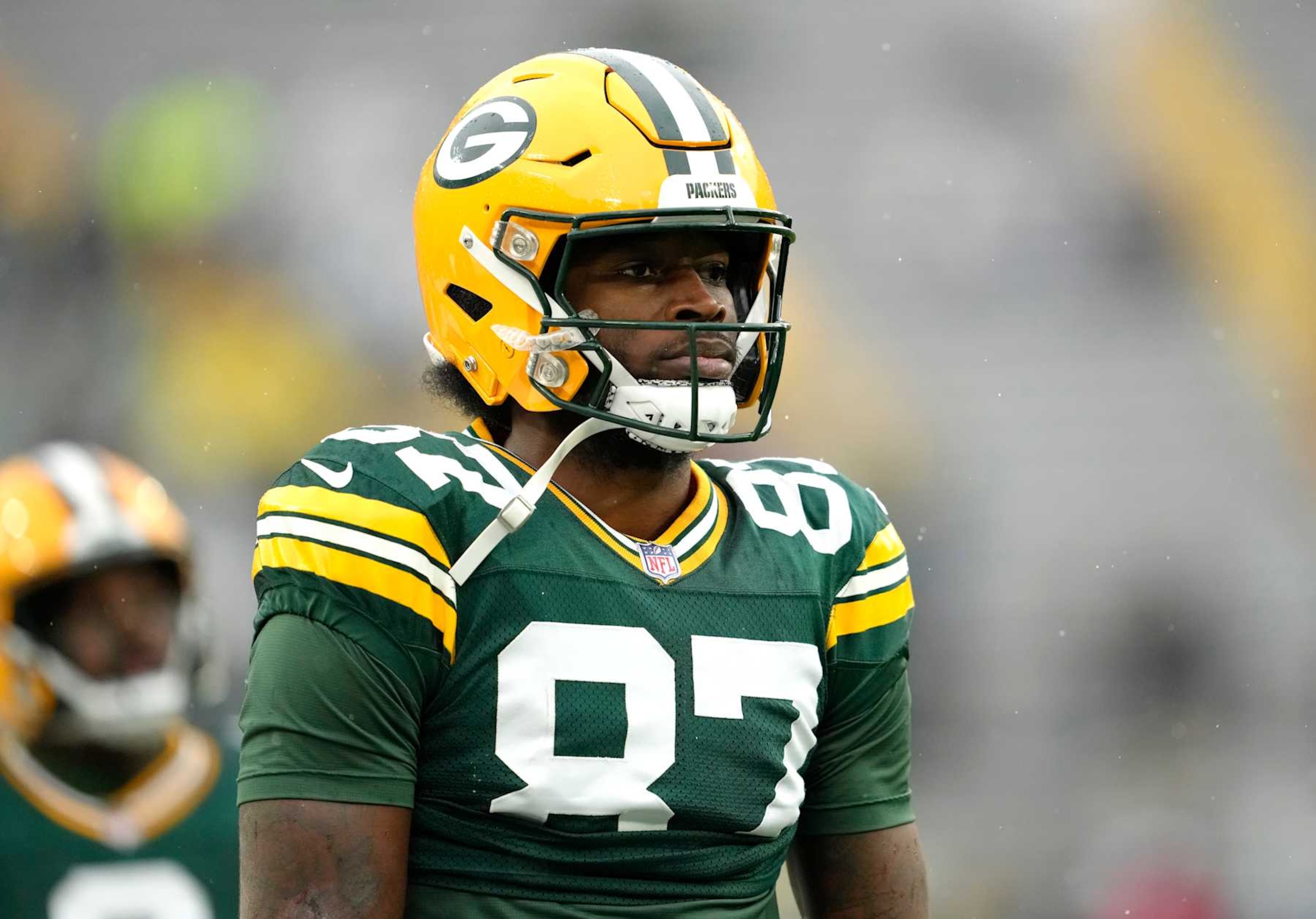 GREEN BAY, WISCONSIN - OCTOBER 13: Romeo Doubs #87 of the Green Bay Packers warms up prior to playing the Arizona Cardinals at Lambeau Field on October 13, 2024 in Green Bay, Wisconsin. (Photo by Patrick McDermott/Getty Images)