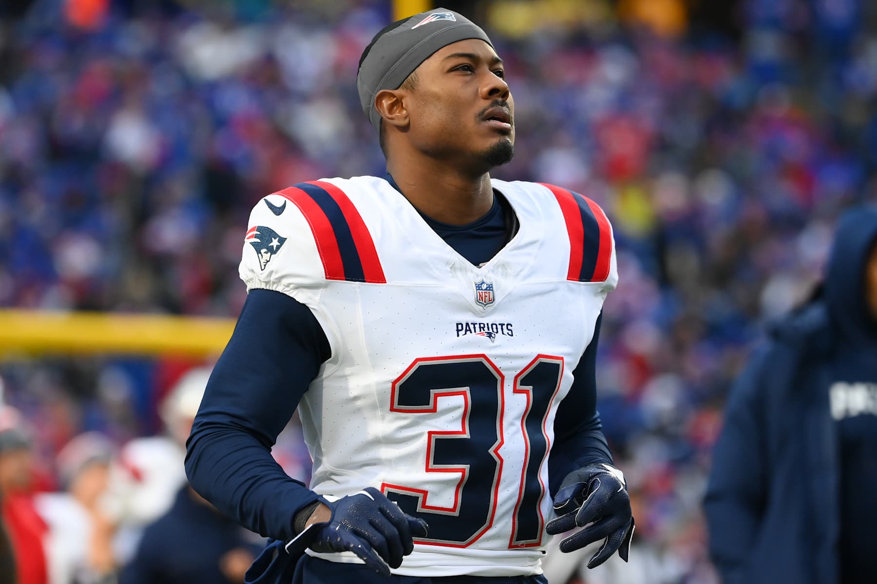 ORCHARD PARK, NEW YORK - DECEMBER 31: Jonathan Jones #31 of the New England Patriots jogs on the field prior to the start of the second half against the Buffalo Bills at Highmark Stadium on December 31, 2023 in Orchard Park, New York. The Bills won 27-21. (Photo by Rich Barnes/Getty Images)