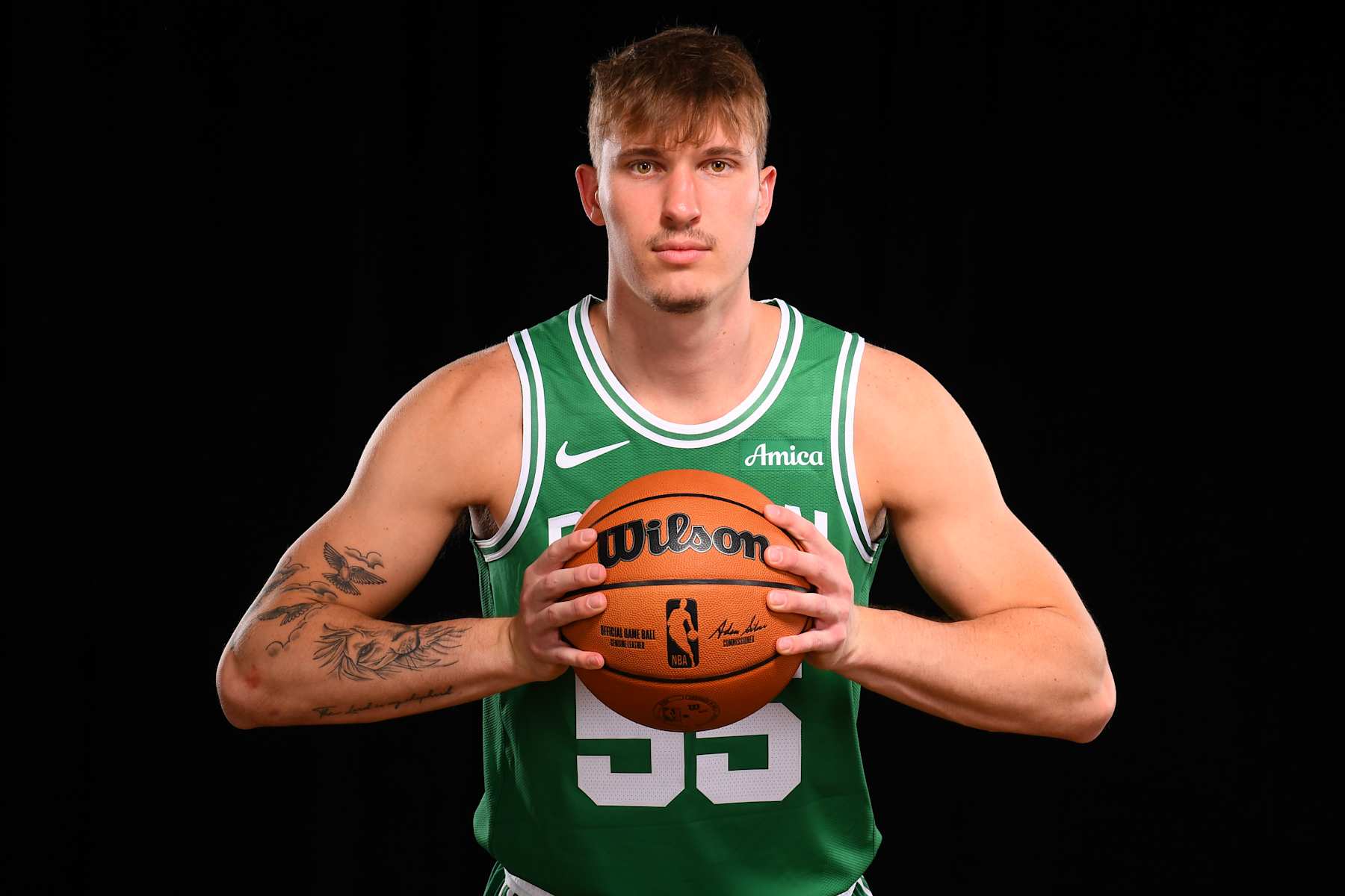 LAS VEGAS, NV - JULY 16: Baylor Scheierman #55 of the Boston Celtics poses for a portrait during the 2024 NBA Rookie Photo Shoot on July 16, 2024 at the University of Nevada, Las Vegas campus in Las Vegas, Nevada. NOTE TO USER: User expressly acknowledges and agrees that, by downloading and/or using this Photograph, user is consenting to the terms and conditions of the Getty Images License Agreement. Mandatory Copyright Notice: Copyright 2024 NBAE (Photo by Brian Babineau/NBAE via Getty Images)