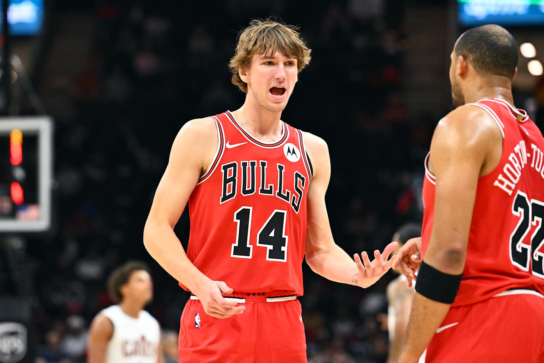 CLEVELAND, OHIO - OCTOBER 08: Matas Buzelis #14 talks with Talen Horton-Tucker #22 of the Chicago Bulls during the second half of a preseason game against the Cleveland Cavaliers at Rocket Mortgage Fieldhouse on October 08, 2024 in Cleveland, Ohio. The Bulls defeated the Cavaliers 116-112. NOTE TO USER: User expressly acknowledges and agrees that, by downloading and or using this photograph, User is consenting to the terms and conditions of the Getty Images License Agreement. (Photo by Jason Miller/Getty Images)
