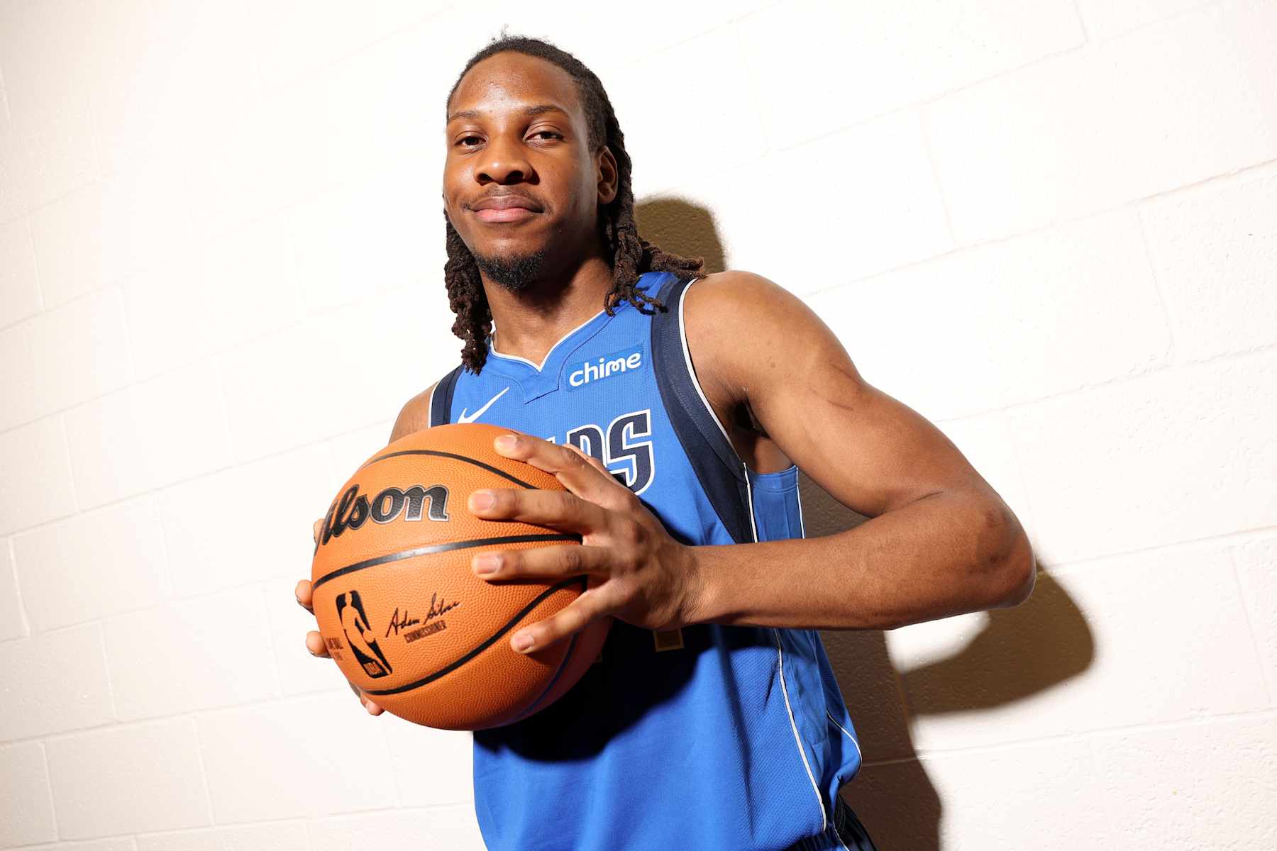 LAS VEGAS, NEVADA - JULY 16: Melvin Ajinça #17 of the Dallas Mavericks poses for a portrait during the 2024 NBA Rookie Photo Shoot at UNLV on July 16, 2024 in Las Vegas, Nevada.  (Photo by Monica Schipper/Getty Images)