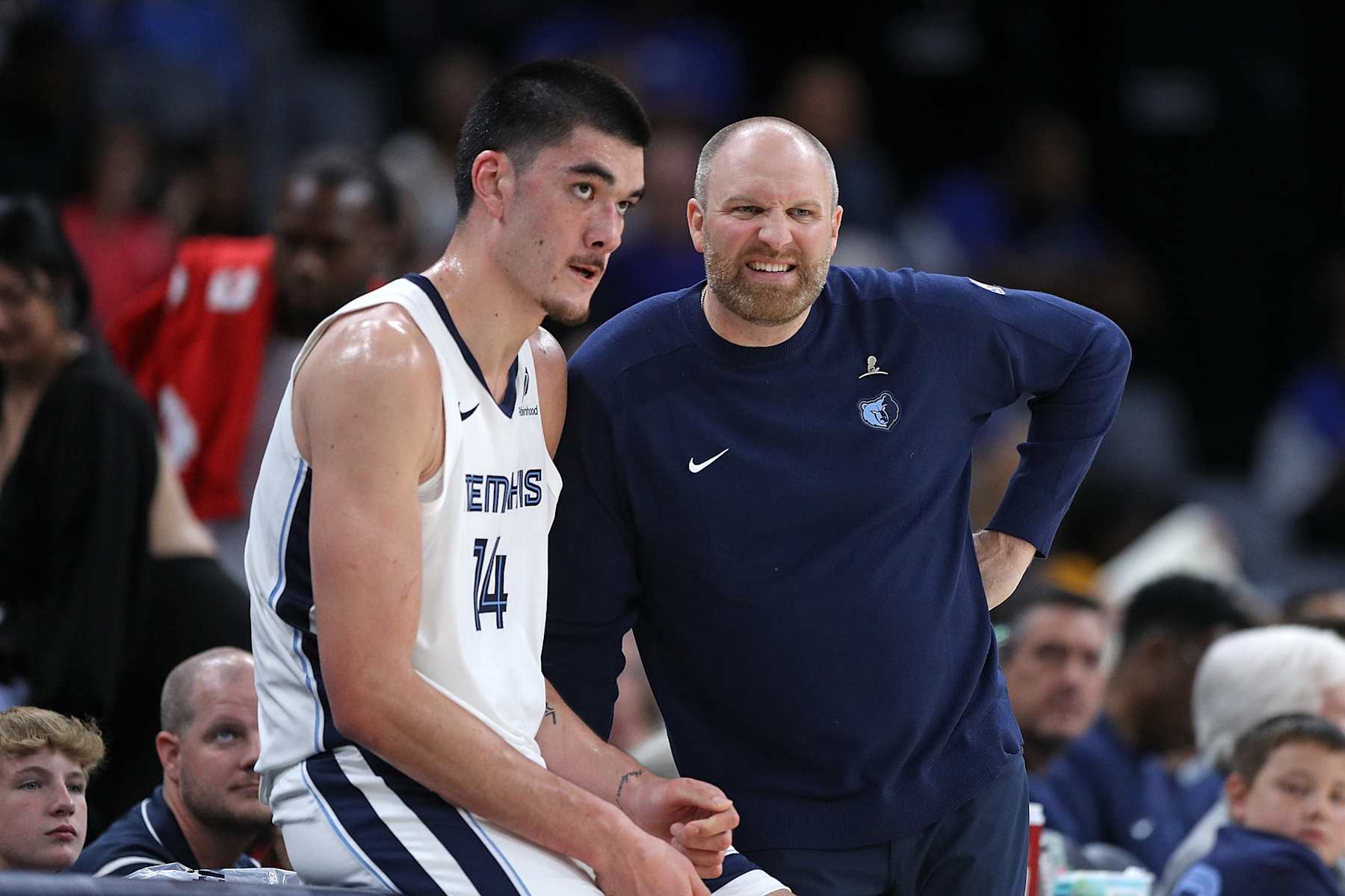 MEMPHIS, TENNESSEE - OCTOBER 10: Zach Edey #14 and Head Coach Taylor Jenkins of the Memphis Grizzlies during the second half against the Charlotte Hornets at FedExForum on October 10, 2024 in Memphis, Tennessee. NOTE TO USER: User expressly acknowledges and agrees that, by downloading and or using this photograph, User is consenting to the terms and conditions of the Getty Images License Agreement. (Photo by Justin Ford/Getty Images)