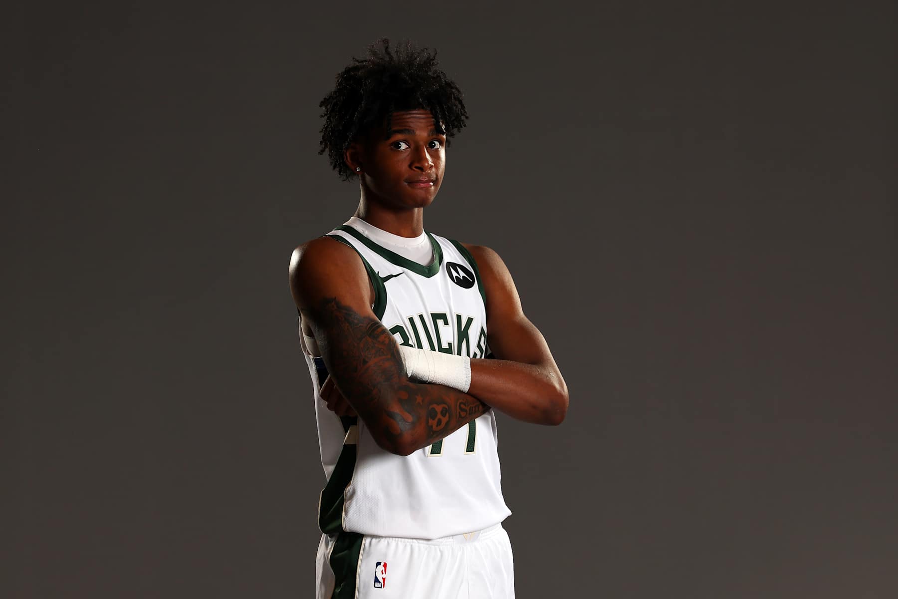 MILWAUKEE, WISCONSIN - SEPTEMBER 30: AJ Johnson #77 of the Milwaukee Bucks poses for a portrait during media day at the Fiserv Forum on September 30, 2024 in Milwaukee, Wisconsin.  NOTE TO USER: User expressly acknowledges and agrees that, by downloading and or using this photograph, User is consenting to the terms and conditions of the Getty Images License Agreement. (Photo by Stacy Revere/Getty Images)