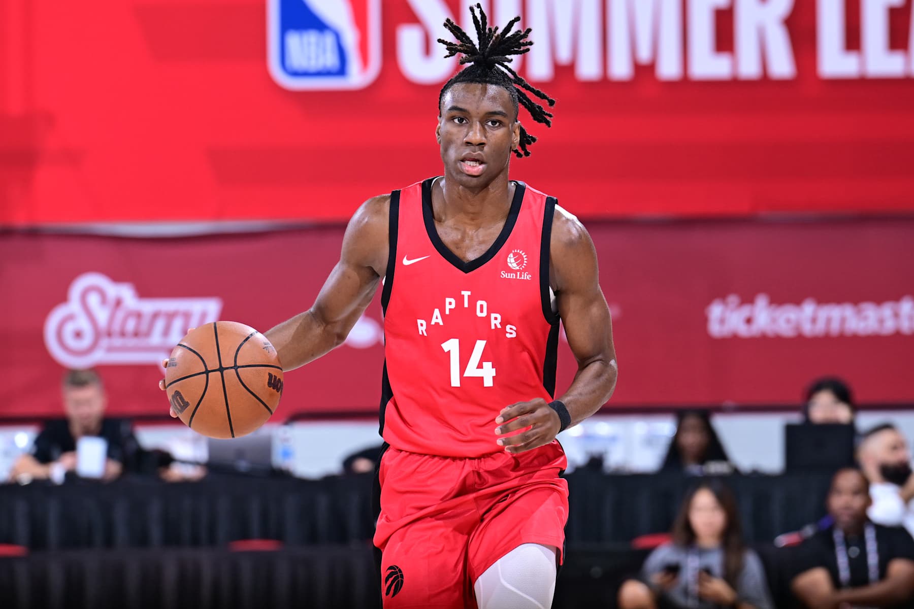 LAS VEGAS, NV - JULY 19: Ja'Kobe Walter #14 of the Toronto Raptors handles the ball during the game against the Miami Heat on July 19, 2024 at the COX Pavilion in Las Vegas, Nevada. NOTE TO USER: User expressly acknowledges and agrees that, by downloading and or using this photograph, User is consenting to the terms and conditions of the Getty Images License Agreement. Mandatory Copyright Notice: Copyright 2024 NBAE (Photo by Adam Hagy/NBAE via Getty Images)