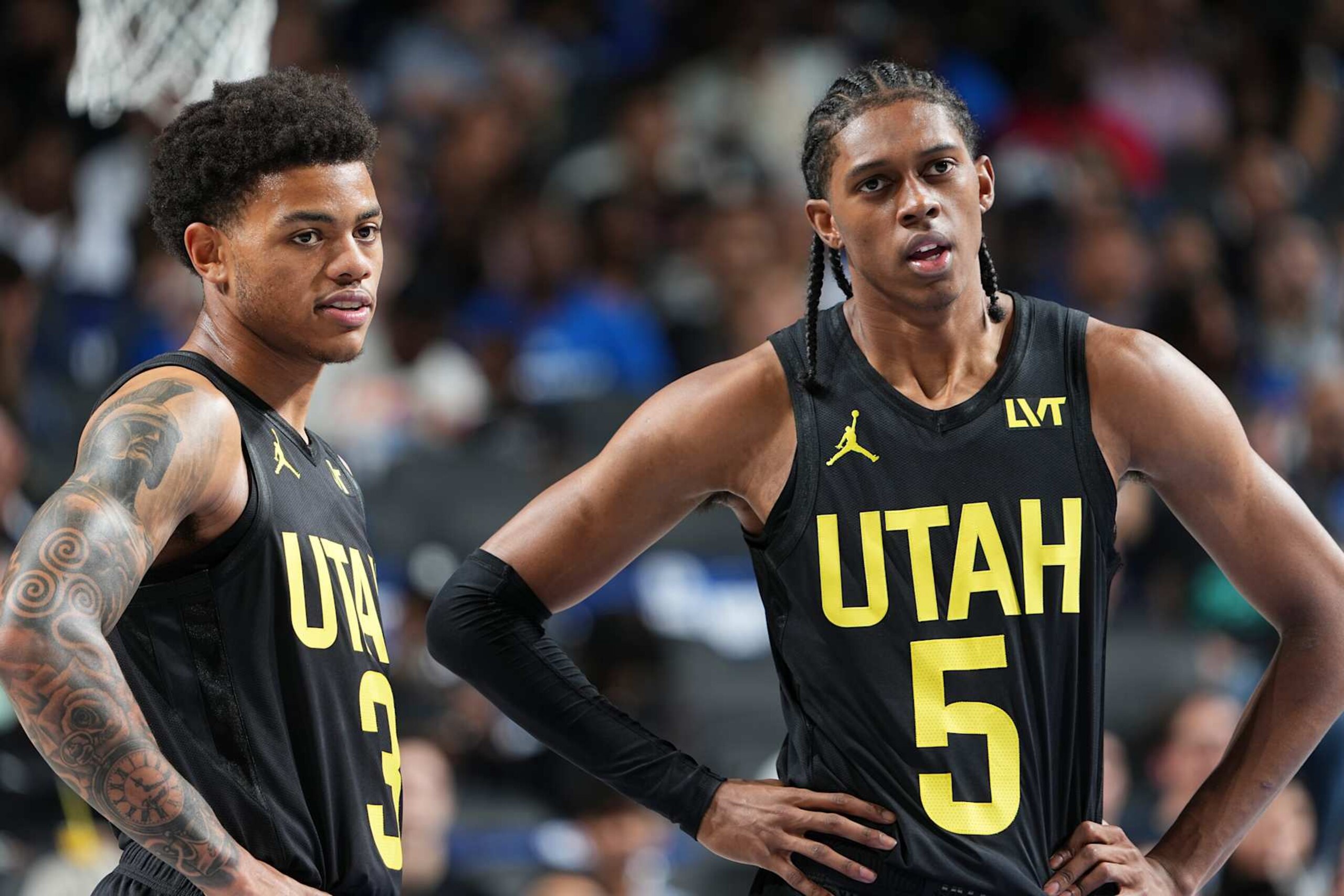 DALLAS, TX - OCTOBER 10: Keyonte George #3 and Cody Williams #5 of the Utah Jazz looks on during the game against the Dallas Mavericks on October 10, 2024 at American Airlines Center in Dallas, Texas. NOTE TO USER: User expressly acknowledges and agrees that, by downloading and or using this photograph, User is consenting to the terms and conditions of the Getty Images License Agreement. Mandatory Copyright Notice: Copyright 2024 NBAE (Photo by Glenn James/NBAE via Getty Images)