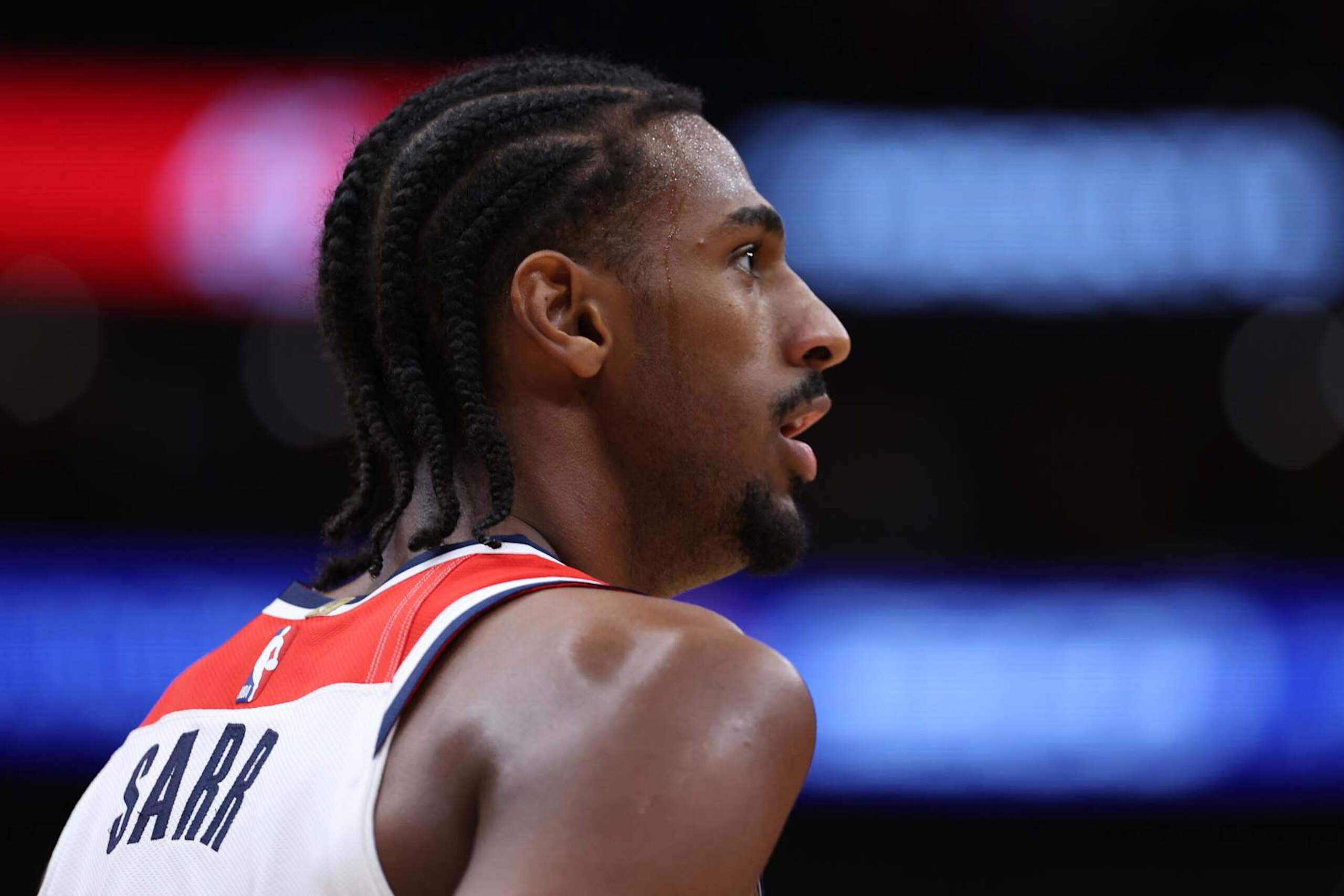 WASHINGTON, DC - OCTOBER 11: Alex Sarr #20 of the Washington Wizards looks on against the Toronto Raptors during the first half of a preseason game at Capital One Arena on October 11, 2024 in Washington, DC. NOTE TO USER: User expressly acknowledges and agrees that, by downloading and or using this photograph, User is consenting to the terms and conditions of the Getty Images License Agreement. (Photo by Patrick Smith/Getty Images)
