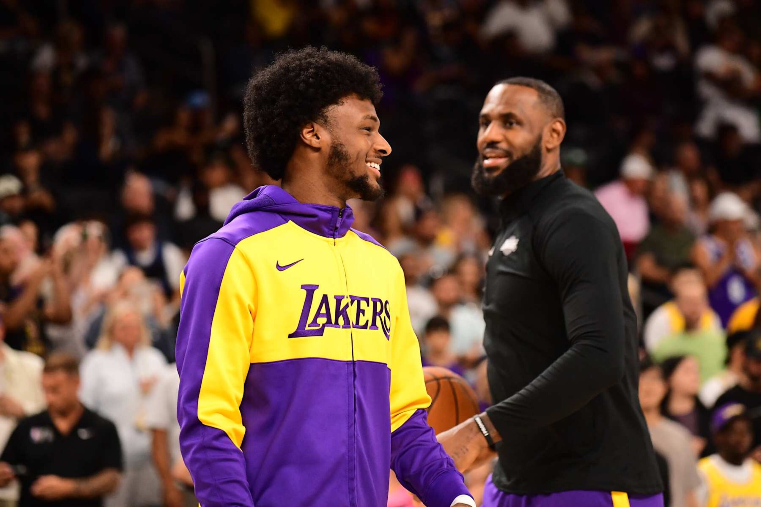 LOS ANGELES, CA - OCTOBER 6: Bronny James #9 of the Los Angeles Lakers smiles before the game against the Phoenix Suns on October 6, 2024 at Acrisure Arena in Palm Springs, California. NOTE TO USER: User expressly acknowledges and agrees that, by downloading and/or using this Photograph, user is consenting to the terms and conditions of the Getty Images License Agreement. Mandatory Copyright Notice: Copyright 2024 NBAE (Photo by Adam Pantozzi/NBAE via Getty Images) LOS ANGELES, CA - OCTOBER 6: Bronny James #9 of the Los Angeles Lakers smiles before the game against the Phoenix Suns on October 6, 2024 at Acrisure Arena in Palm Springs, California. NOTE TO USER: User expressly acknowledges and agrees that, by downloading and/or using this Photograph, user is consenting to the terms and conditions of the Getty Images License Agreement. Mandatory Copyright Notice: Copyright 2024 NBAE (Photo by Adam Pantozzi/NBAE via Getty Images)