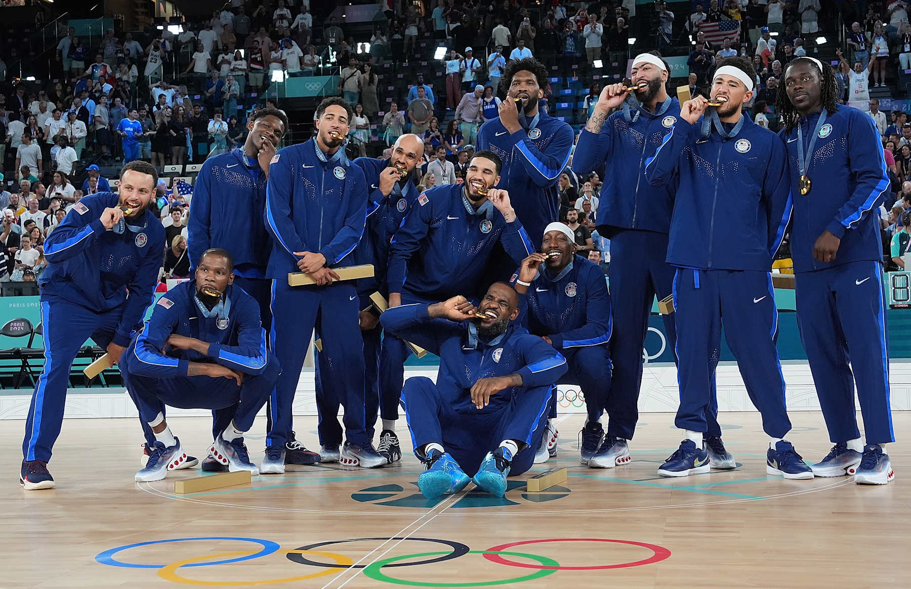 Gold medalists team USA pose for a group photo after the victory ceremony for the men's basketball at the Paris 2024 Olympic Games in Paris, France, Aug. 10, 2024. (Photo by Meng Yongmin/Xinhua via Getty Images)