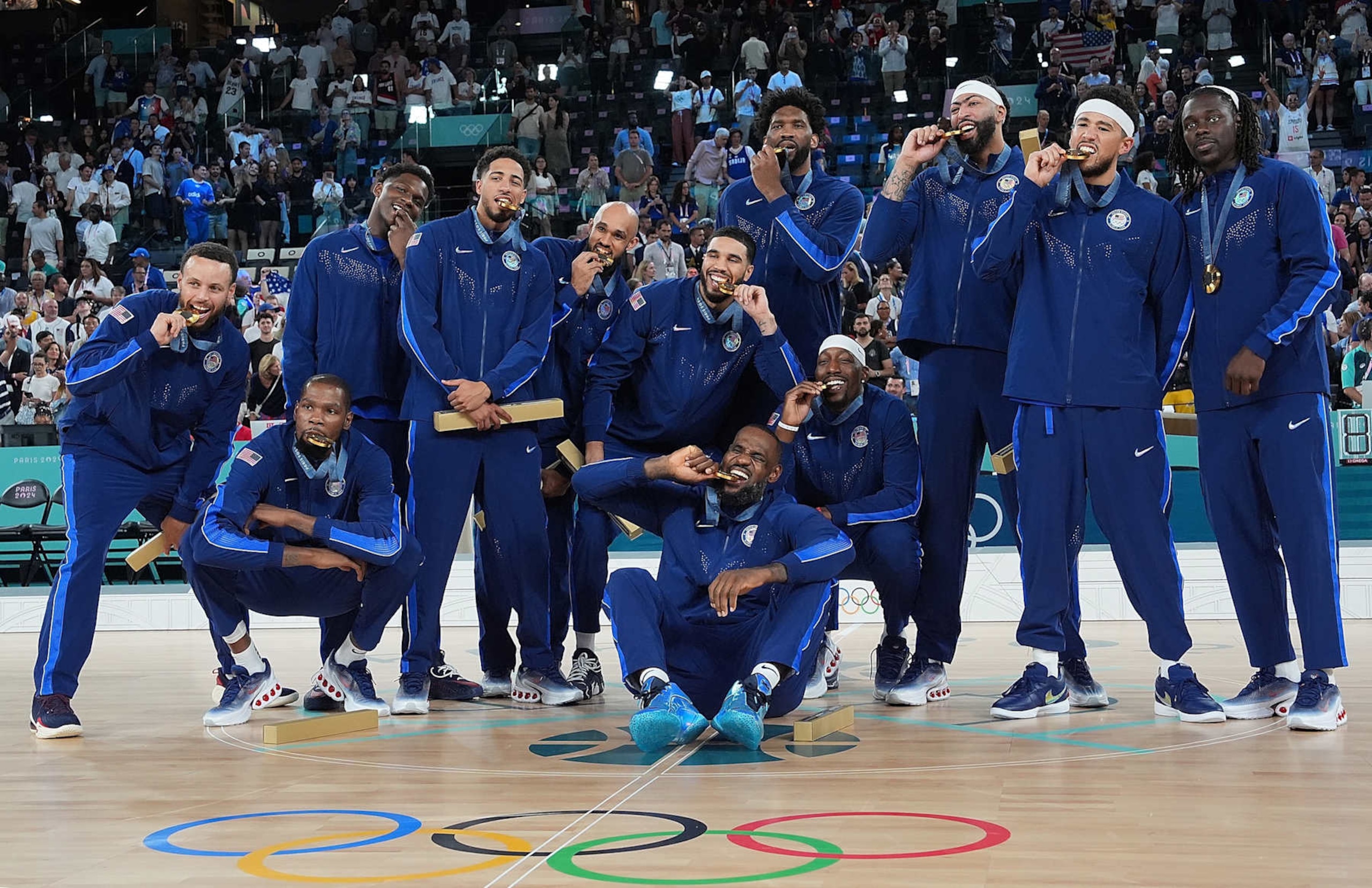 Gold medalists team USA pose for a group photo after the victory ceremony for the men's basketball at the Paris 2024 Olympic Games in Paris, France, Aug. 10, 2024. (Photo by Meng Yongmin/Xinhua via Getty Images)