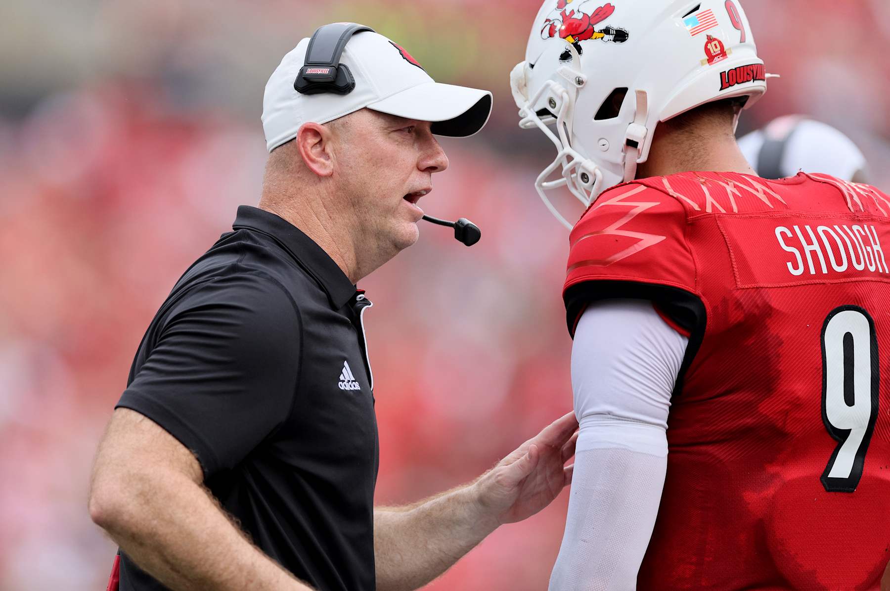 LOUISVILLE, KENTUCKY - SEPTEMBER 21: Jeff Brohm the head coach of the Louisville Cardinals gives instructions to his team against the Georgia Tech Yellow Jackets at L&N Federal Credit Union Stadium on September 21, 2024 in Louisville, Kentucky. (Photo by Andy Lyons/Getty Images)