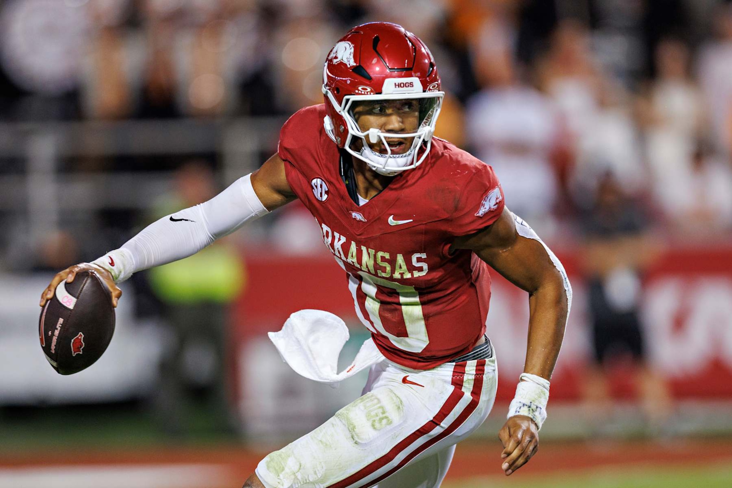 FAYETTEVILLE, ARKANSAS - OCTOBER 05: Taylen Green #10 of the Arkansas Razorbacks avoids the rush during a game against the Tennessee Volunteers at Donald W. Reynolds Razorback Stadium on October 05, 2024 in Fayetteville, Arkansas. The Razorbacks defeated the Volunteers 19-14.  (Photo by Wesley Hitt/Getty Images)