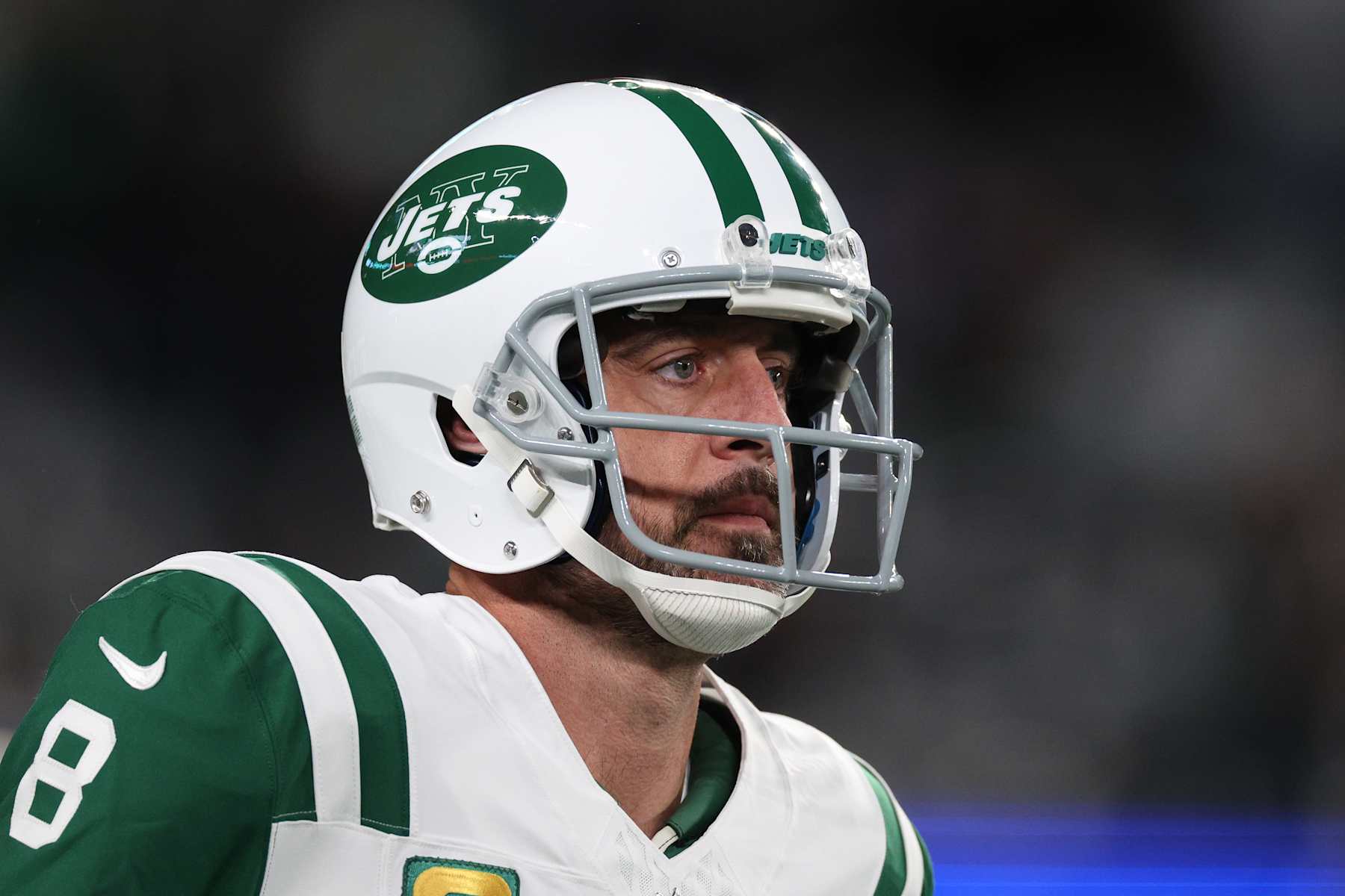 EAST RUTHERFORD, NEW JERSEY - OCTOBER 14: Aaron Rodgers #8 of the New York Jets warms up prior to the game against the Buffalo Bills at MetLife Stadium on October 14, 2024 in East Rutherford, New Jersey. (Photo by Elsa/Getty Images)