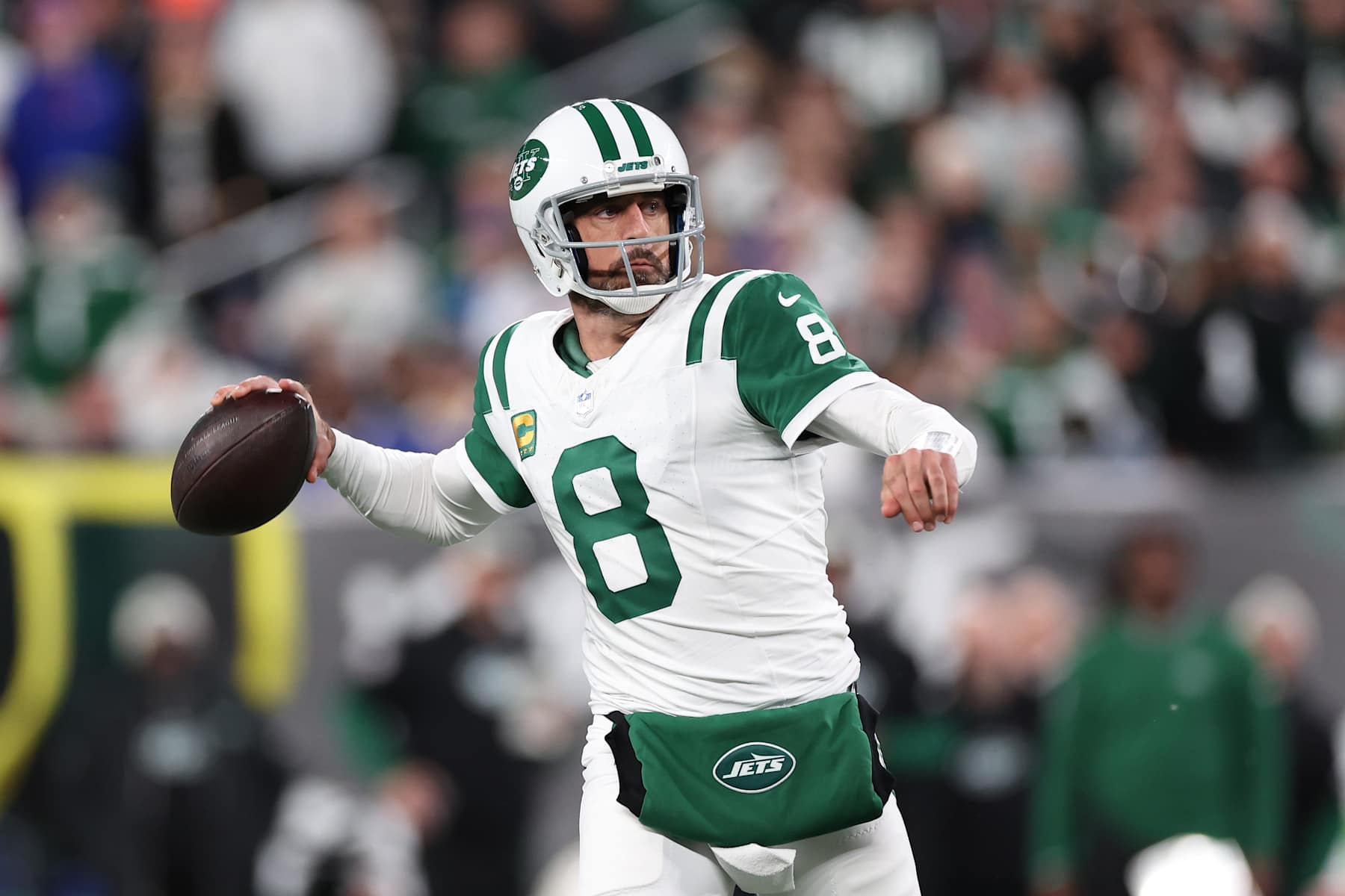 EAST RUTHERFORD, NEW JERSEY - OCTOBER 14: Aaron Rodgers #8 of the New York Jets throws a pass during the first quarter against the Buffalo Bills at MetLife Stadium on October 14, 2024 in East Rutherford, New Jersey. (Photo by Luke Hales/Getty Images)
