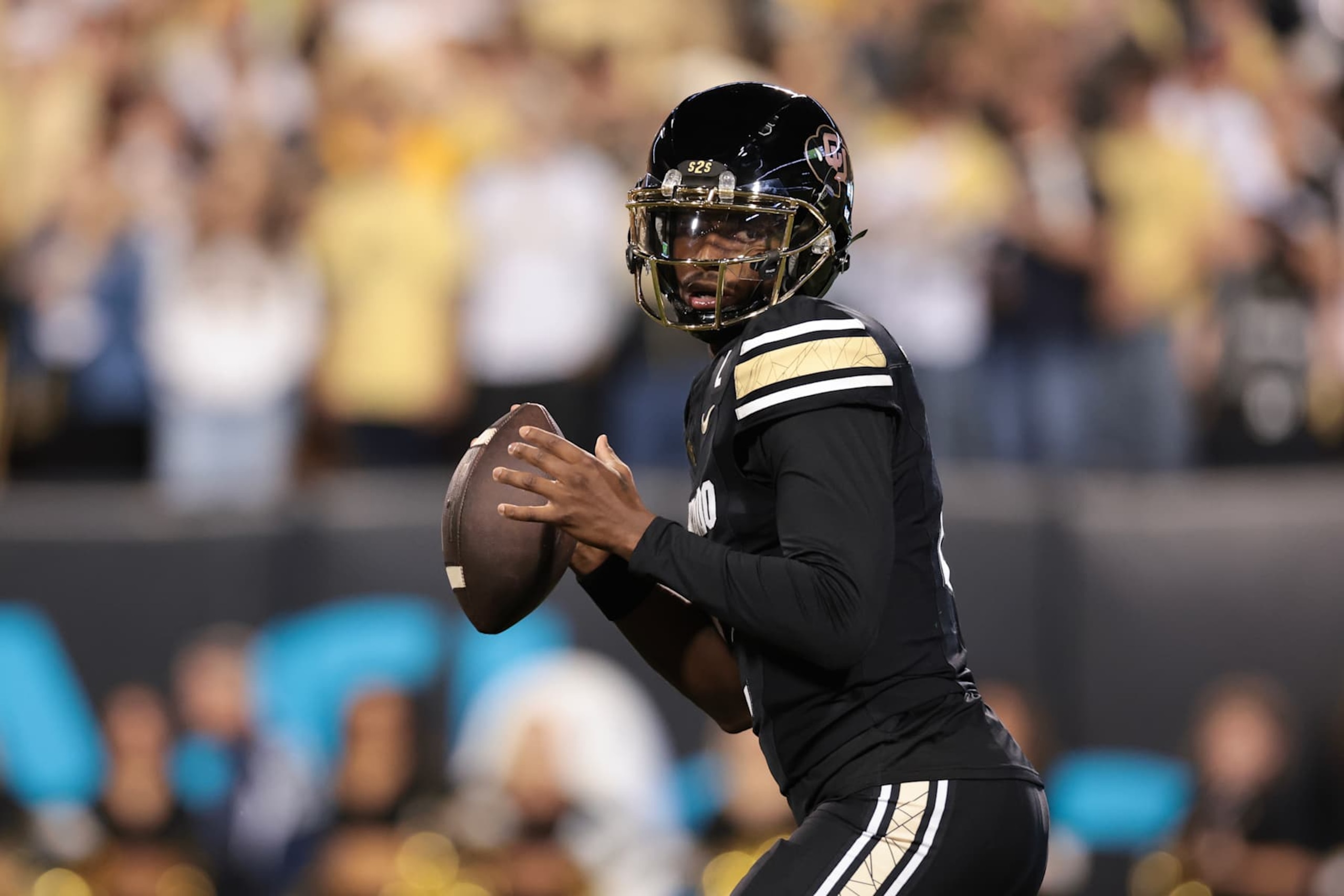 BOULDER, COLORADO - OCTOBER 12: Shedeur Sanders #2 of the Colorado Buffaloes looks to pass during the first half against the Kansas State Wildcats at Folsom Field on October 12, 2024 in Boulder, Colorado. (Photo by Andrew Wevers/Getty Images)