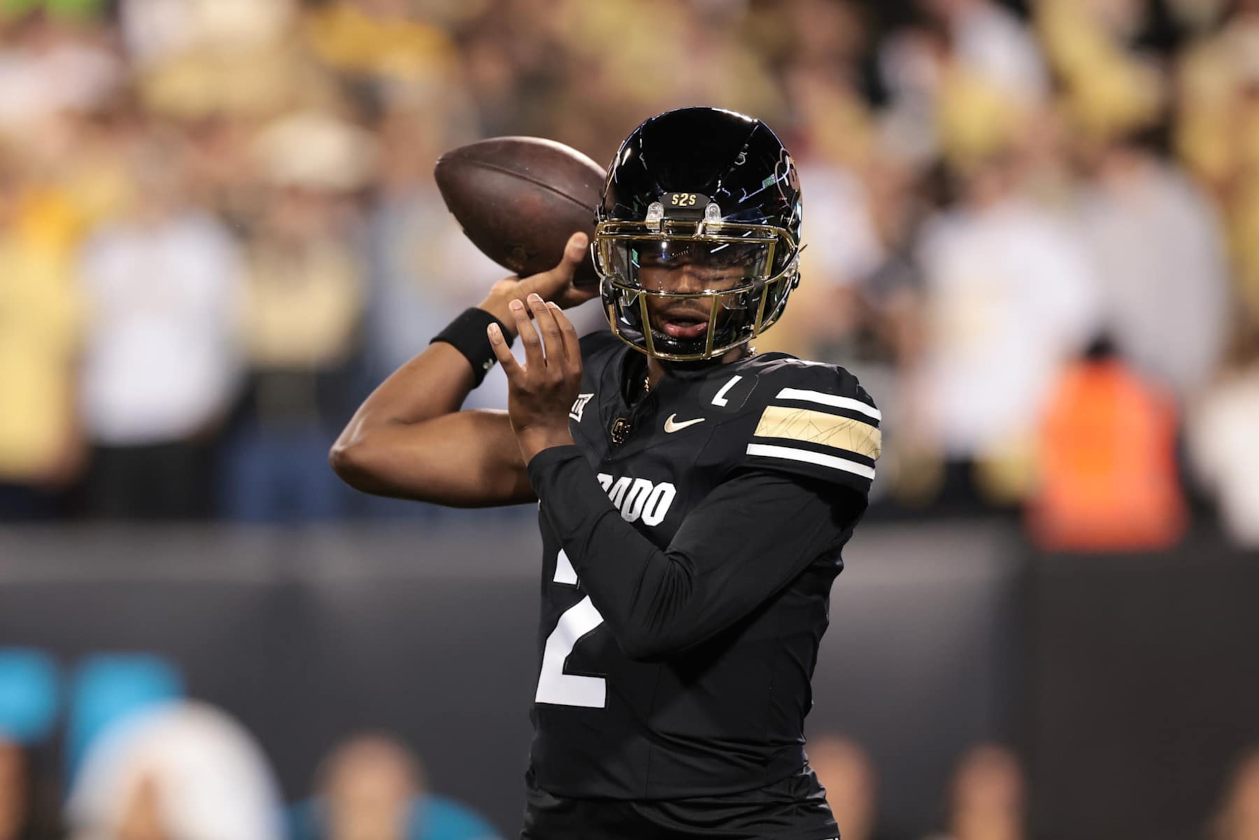 BOULDER, COLORADO - OCTOBER 12: Shedeur Sanders #2 of the Colorado Buffaloes looks to pass during the first half against the Kansas State Wildcats at Folsom Field on October 12, 2024 in Boulder, Colorado. (Photo by Andrew Wevers/Getty Images)