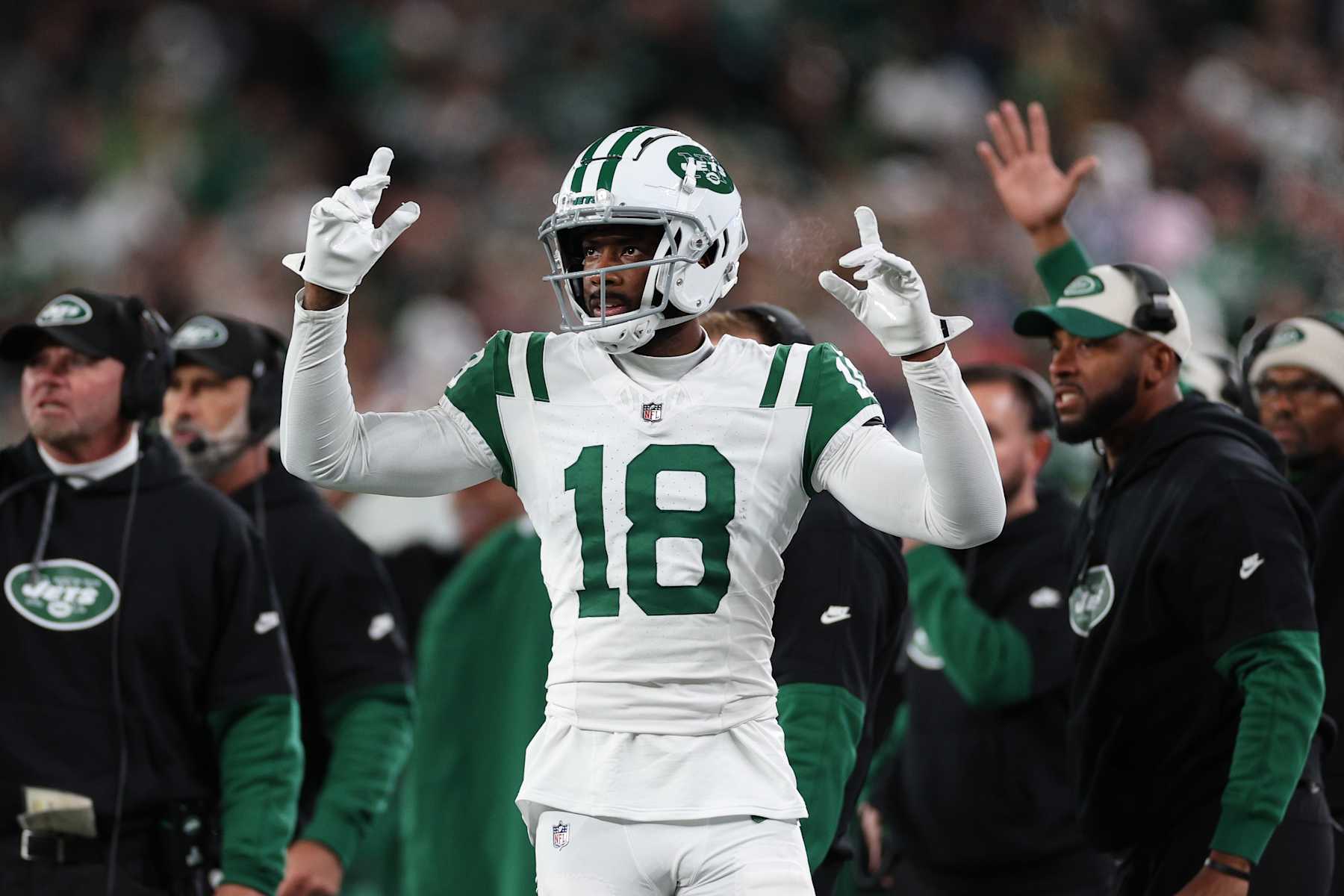 EAST RUTHERFORD, NEW JERSEY - OCTOBER 14: Mike Williams #18 of the New York Jets reacts after a touchdown during the first quarter against the Buffalo Bills at MetLife Stadium on October 14, 2024 in East Rutherford, New Jersey. (Photo by Elsa/Getty Images)