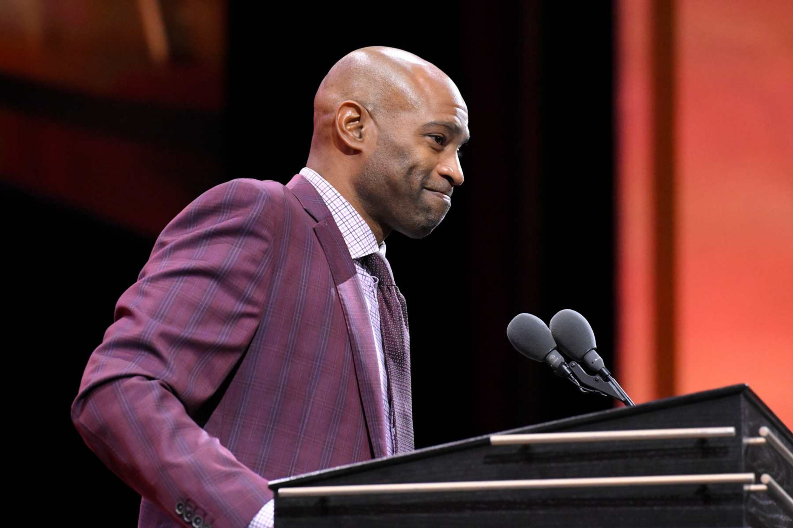 SPRINGFIELD, MA - OCTOBER 13: Inductee Vince Carter speaks during the 2024 Basketball Hall of Fame Enshrinement Ceremony on October 13, 2024 at Symphony Hall in Springfield, Massachusetts. NOTE TO USER: User expressly acknowledges and agrees that, by downloading and/or using this photograph, user is consenting to the terms and conditions of the Getty Images License Agreement.  Mandatory Copyright Notice: Copyright 2024 NBAE (Photo by David Dow/NBAE via Getty Images)