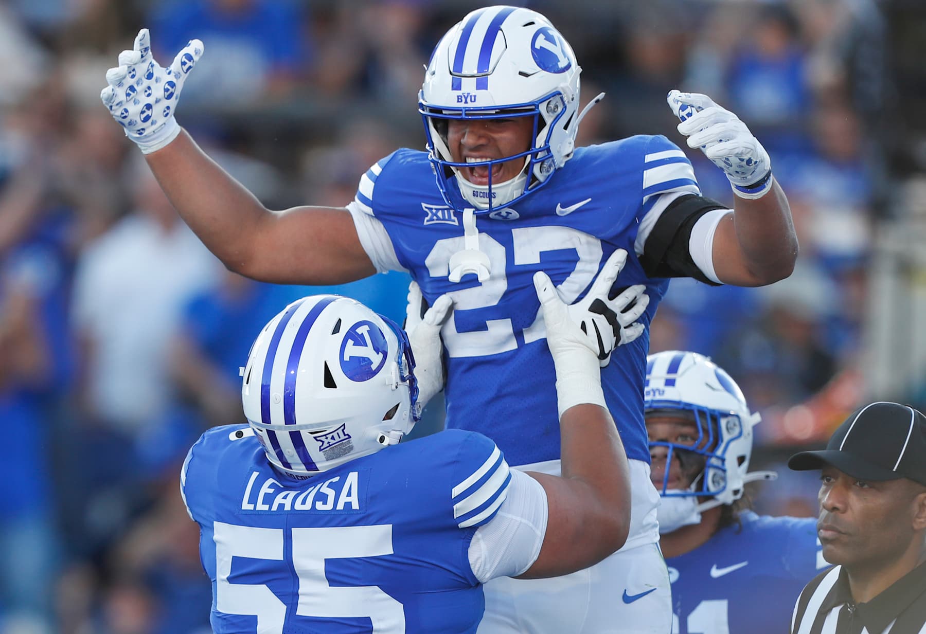 LJ Martin of BYU Cougars celebrates scoring a touchdown with teammate Austin Leausa.