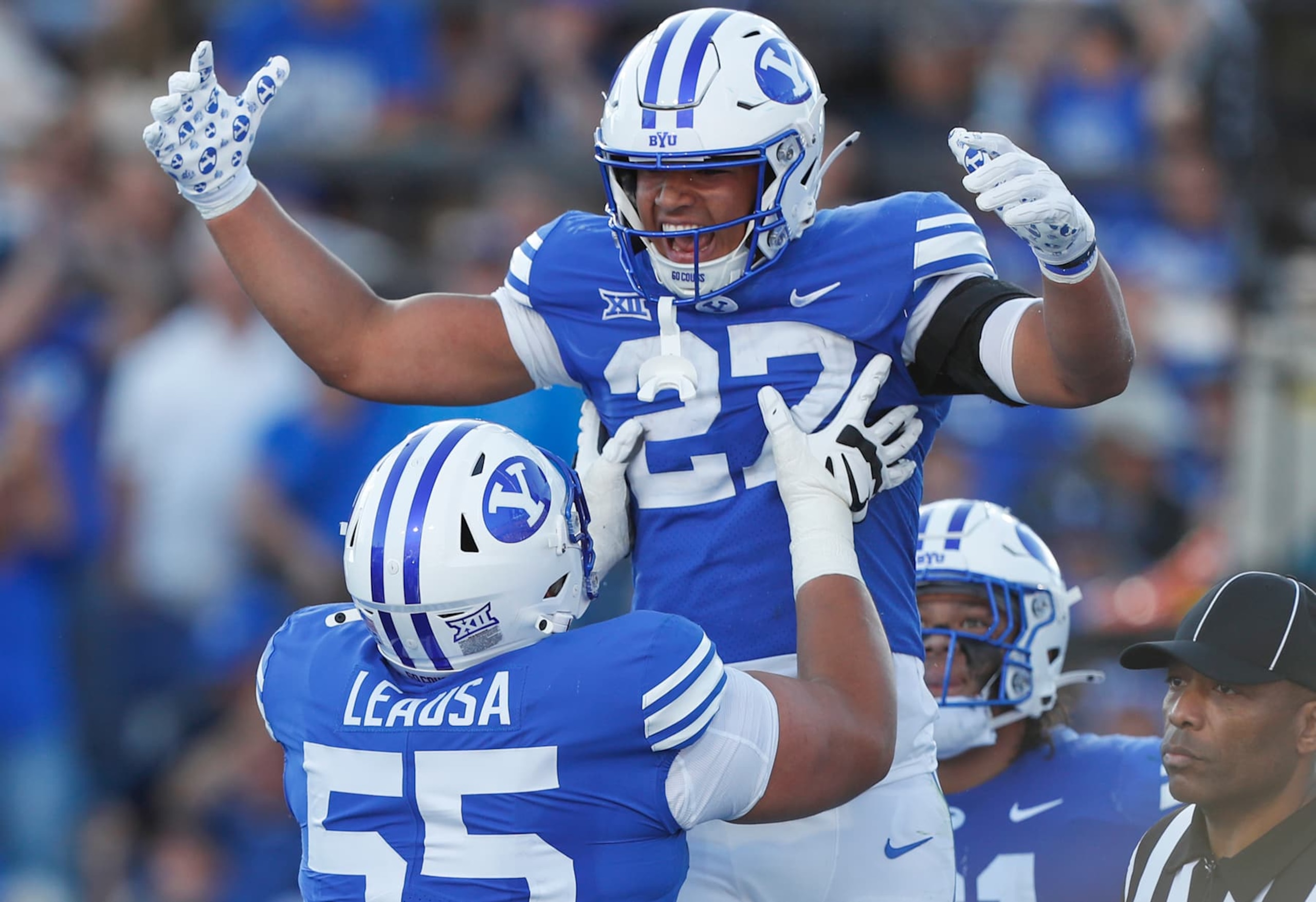 LJ Martin of BYU Cougars celebrates scoring a touchdown with teammate Austin Leausa.