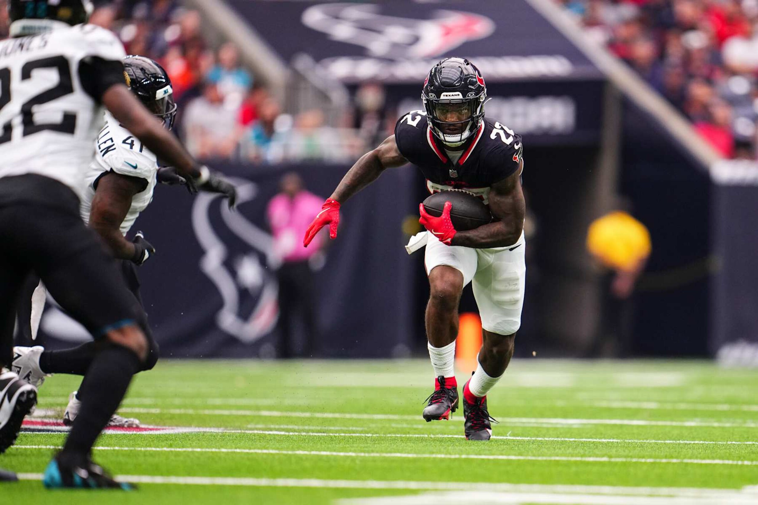 HOUSTON, TX - SEPTEMBER 29: Cam Akers #22 of the Houston Texans runs the ball during an NFL football game against the Jacksonville Jaguars at NRG Stadium on September 29, 2024 in Houston, Texas. (Photo by Cooper Neill/Getty Images) HOUSTON, TX - SEPTEMBER 29: Cam Akers #22 of the Houston Texans runs the ball during an NFL football game against the Jacksonville Jaguars at NRG Stadium on September 29, 2024 in Houston, Texas. (Photo by Cooper Neill/Getty Images)
