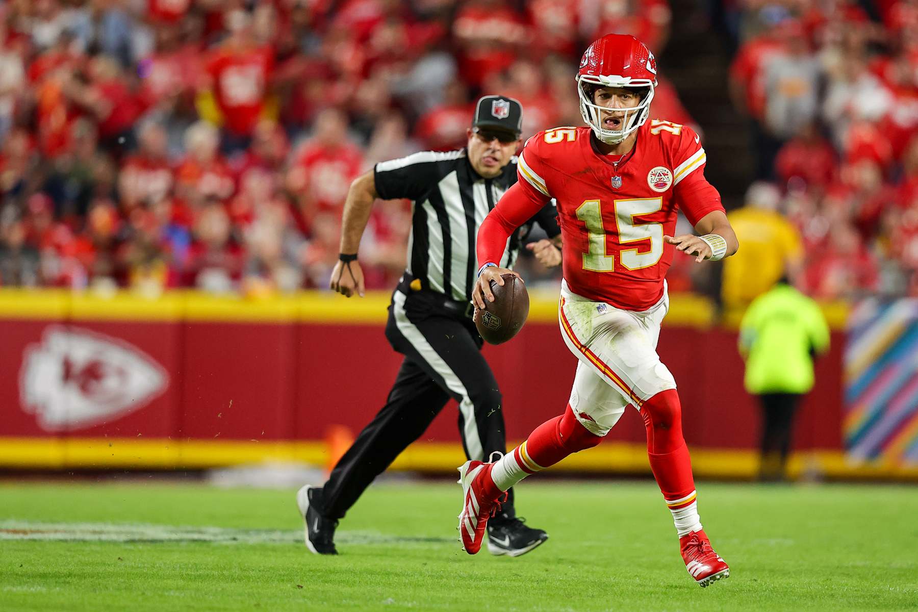 KANSAS CITY, MISSOURI - OCTOBER 7: Patrick Mahomes #15 of the Kansas City Chiefs runs with the football during the second quarter against the New Orleans Saints at GEHA Field at Arrowhead Stadium on October 7, 2024 in Kansas City, Missouri. (Photo by David Eulitt/Getty Images)