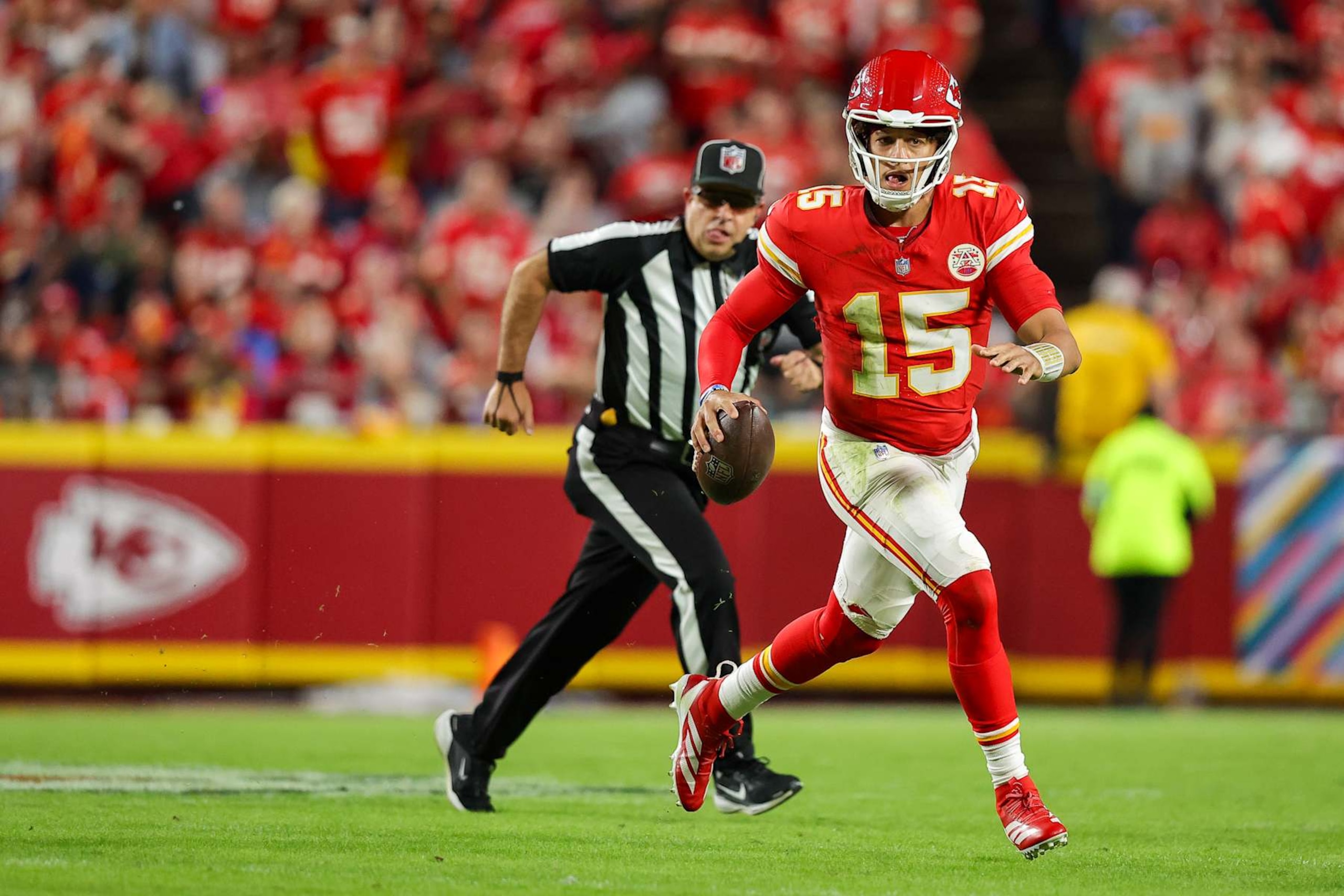 KANSAS CITY, MISSOURI - OCTOBER 7: Patrick Mahomes #15 of the Kansas City Chiefs runs with the football during the second quarter against the New Orleans Saints at GEHA Field at Arrowhead Stadium on October 7, 2024 in Kansas City, Missouri. (Photo by David Eulitt/Getty Images)