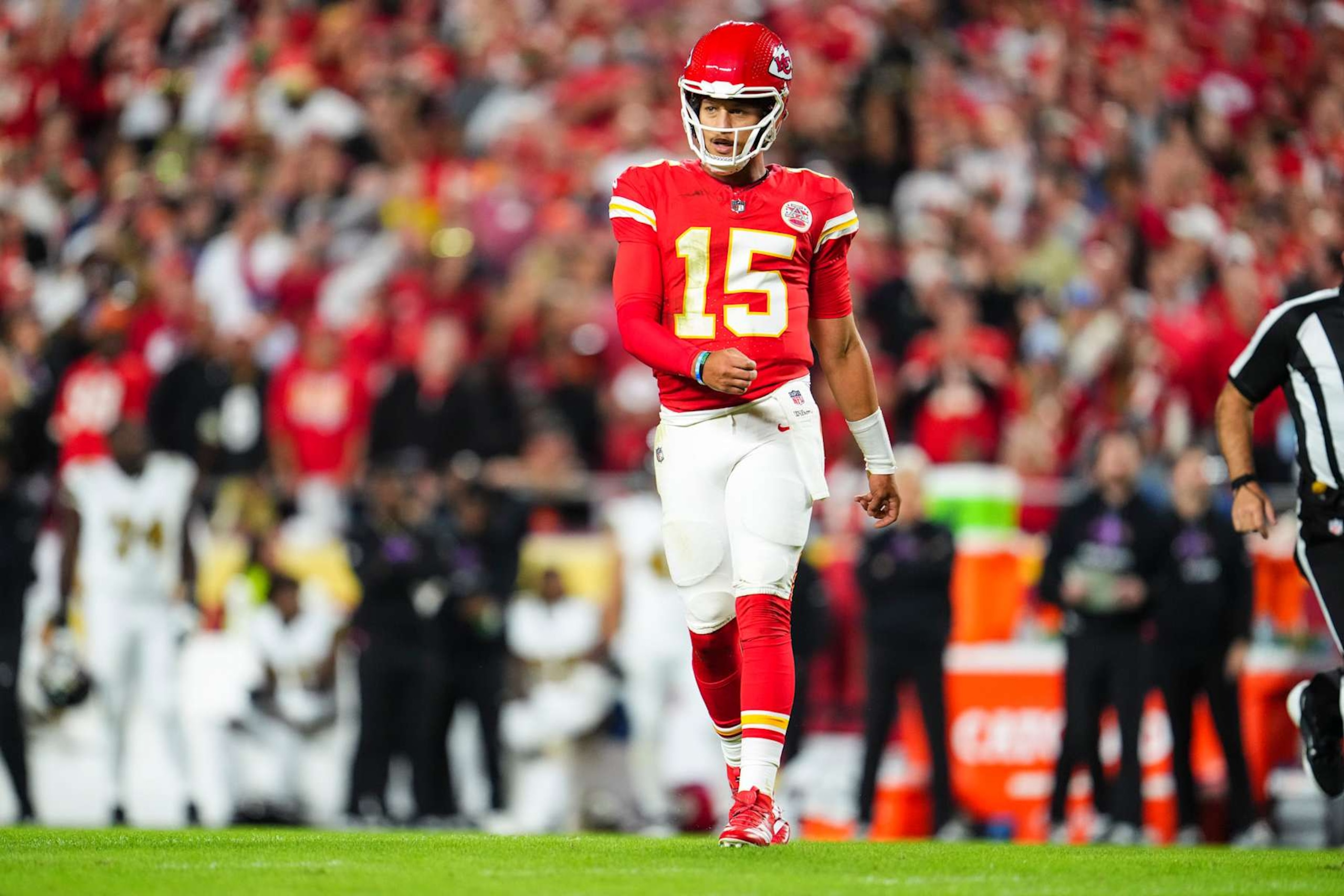 KANSAS CITY, MO - OCTOBER 07: Patrick Mahomes #15 of the Kansas City Chiefs looks on from the field during an NFL football game against the New Orleans Saints at GEHA Field at Arrowhead Stadium on October 7, 2024 in Kansas City, Missouri. (Photo by Cooper Neill/Getty Images)