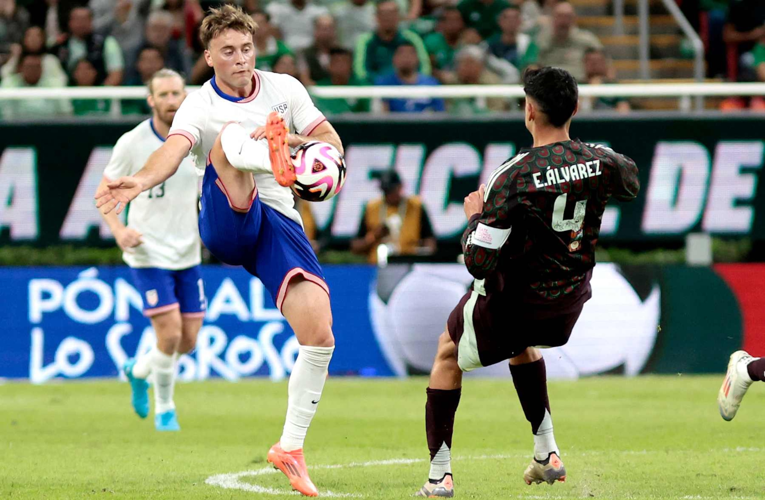 USA's midfielder #07 Aidan Morris (L) and Mexico's defender #04 Edson Alvarez fight for the ball during an international friendly football match between Mexico and USA at the Akron Stadium in Zapopan, Jalisco state, Mexico, on October 15, 2024. (Photo by Ulises Ruiz / AFP) (Photo by ULISES RUIZ/AFP via Getty Images) USA's midfielder #07 Aidan Morris (L) and Mexico's defender #04 Edson Alvarez fight for the ball during an international friendly football match between Mexico and USA at the Akron Stadium in Zapopan, Jalisco state, Mexico, on October 15, 2024. (Photo by Ulises Ruiz / AFP) (Photo by ULISES RUIZ/AFP via Getty Images)
