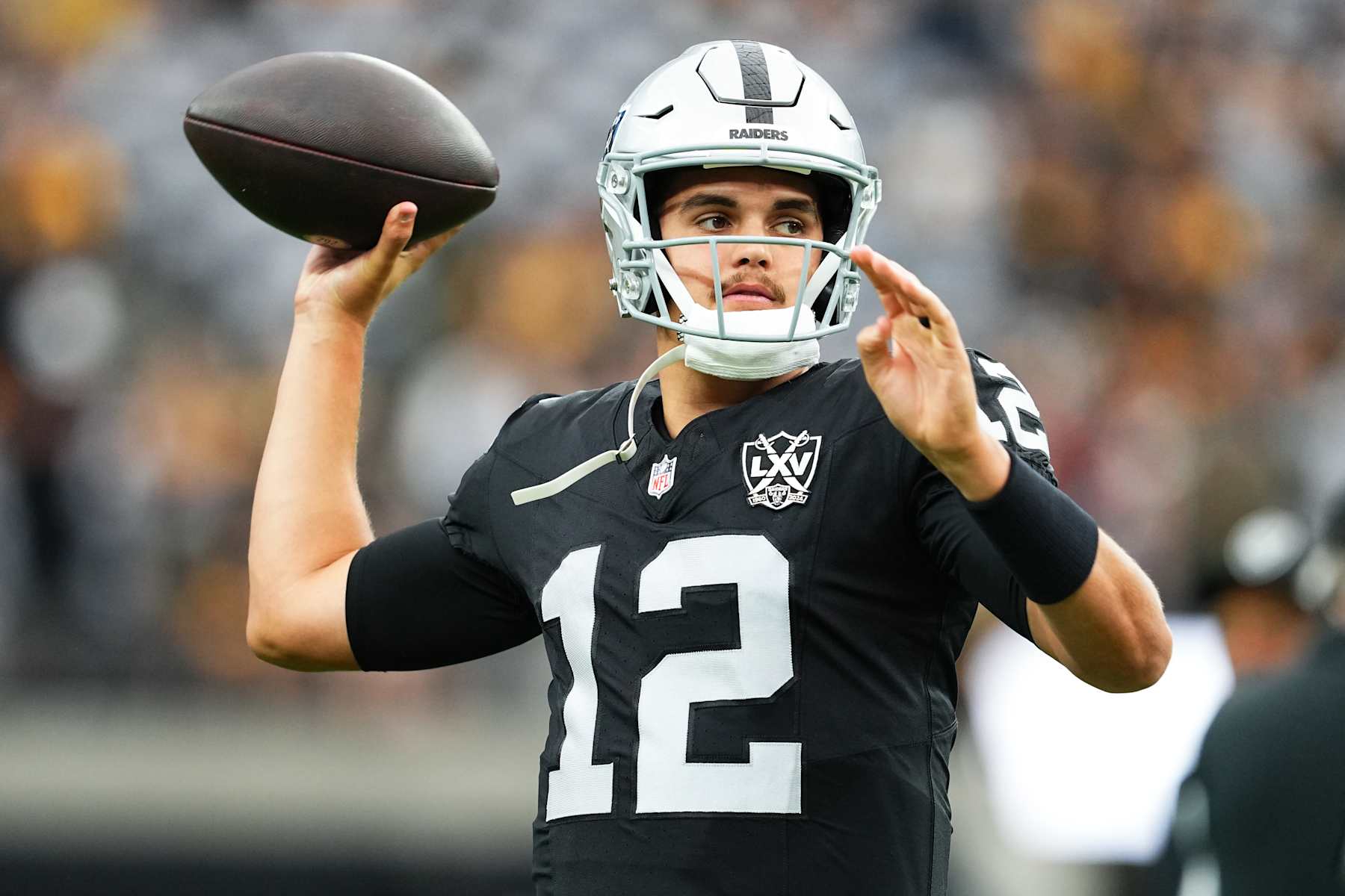 LAS VEGAS, NEVADA - OCTOBER 13: Aidan O'Connell #12 of the Las Vegas Raiders warms-up prior to a game against the Pittsburgh Steelers at Allegiant Stadium on October 13, 2024 in Las Vegas, Nevada. (Photo by Chris Unger/Getty Images)