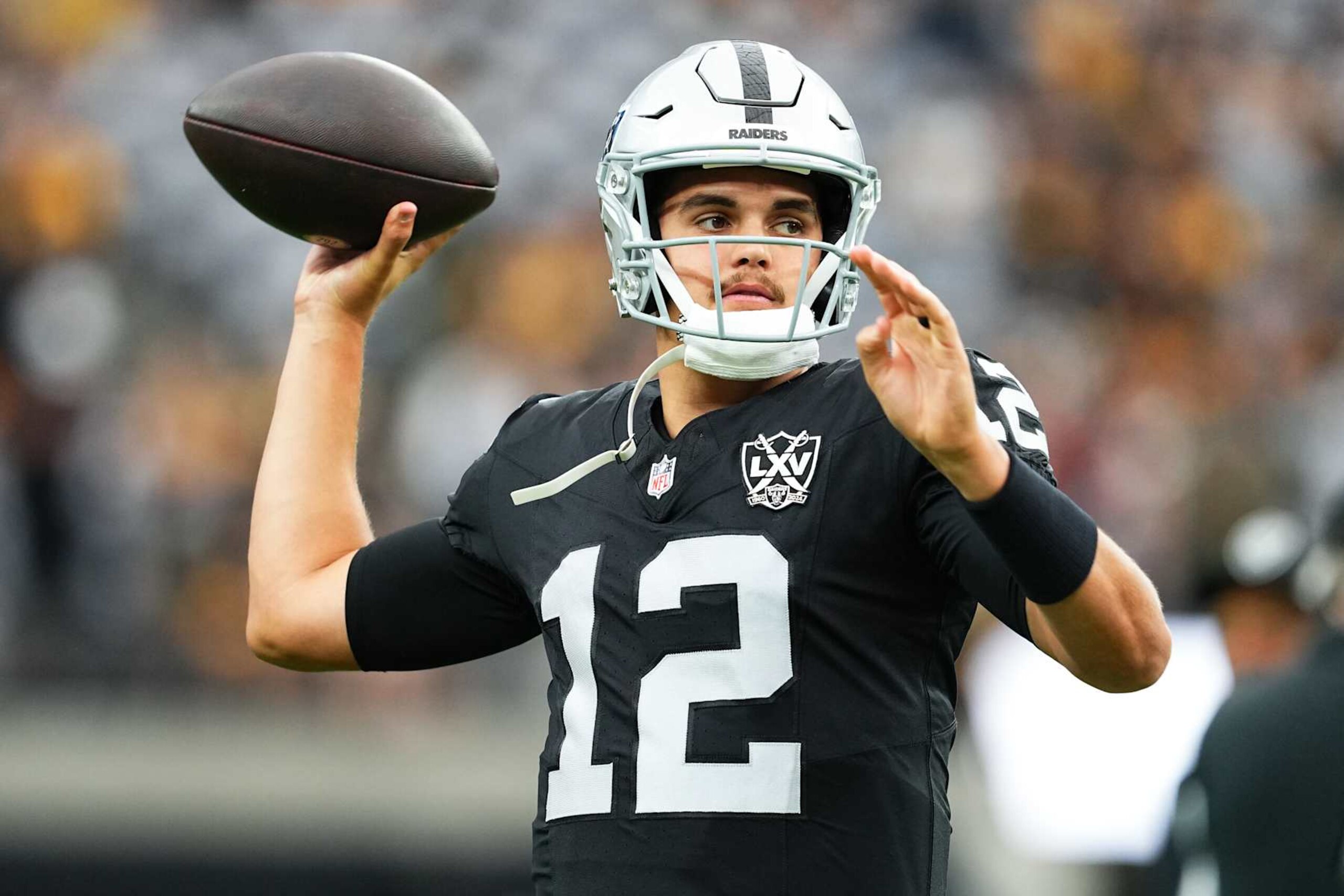 LAS VEGAS, NEVADA - OCTOBER 13: Aidan O'Connell #12 of the Las Vegas Raiders warms-up prior to a game against the Pittsburgh Steelers at Allegiant Stadium on October 13, 2024 in Las Vegas, Nevada. (Photo by Chris Unger/Getty Images)