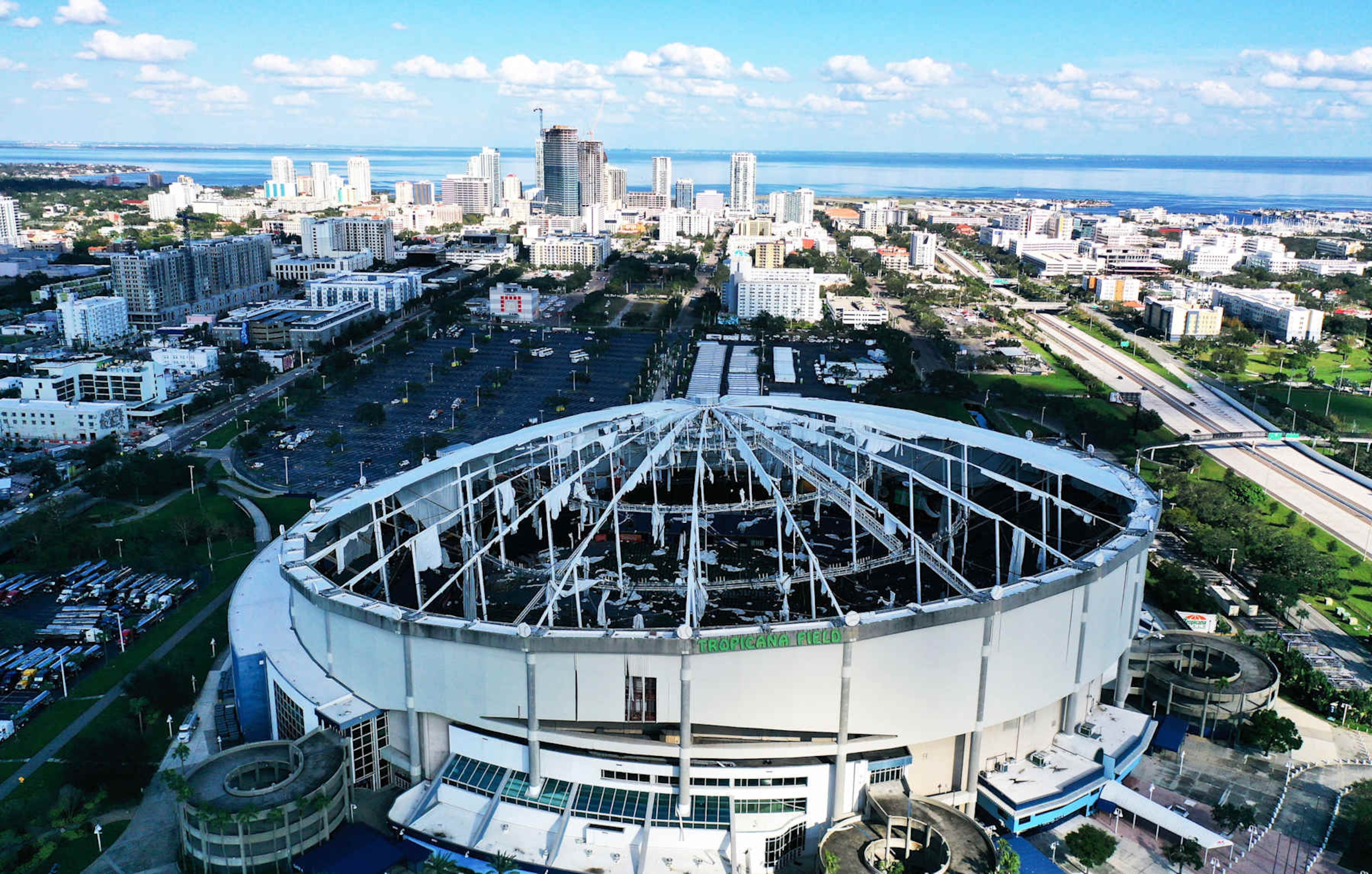 CHIMCHIME, ST PETERSBURG, FLORIDA, UNITED STATES - 2024/10/13: (EDITORS NOTE: Image taken with drone) In this aerial view, the domed roof at Tropicana Field, the home of the Tampa Bay Rays, is seen ripped to shreds from Hurricane Miltonís powerful winds in St. Petersburg. The storm passed through the area on October 10, 2024, making landfall as a Category 3 hurricane in Siesta Key, Florida. (Photo by Paul Hennessy/SOPA Images/LightRocket via Getty Images) CHIMCHIME, ST PETERSBURG, FLORIDA, UNITED STATES - 2024/10/13: (EDITORS NOTE: Image taken with drone) In this aerial view, the domed roof at Tropicana Field, the home of the Tampa Bay Rays, is seen ripped to shreds from Hurricane Miltonís powerful winds in St. Petersburg. The storm passed through the area on October 10, 2024, making landfall as a Category 3 hurricane in Siesta Key, Florida. (Photo by Paul Hennessy/SOPA Images/LightRocket via Getty Images)