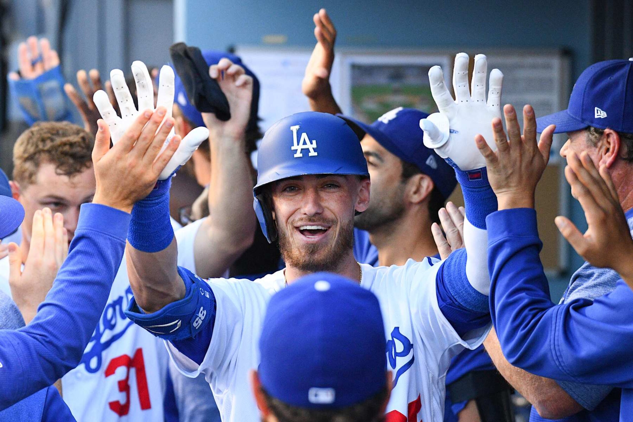 LOS ANGELES, CA - AUGUST 05: Los Angeles Dodgers first baseman Cody Bellinger (35) celebrates in the dugout after his three run home run during a MLB game between the St. Louis Cardinals and the Los Angeles Dodgers on August 5, 2019 at Dodger Stadium in Los Angeles, CA. (Photo by Brian Rothmuller/Icon Sportswire via Getty Images)