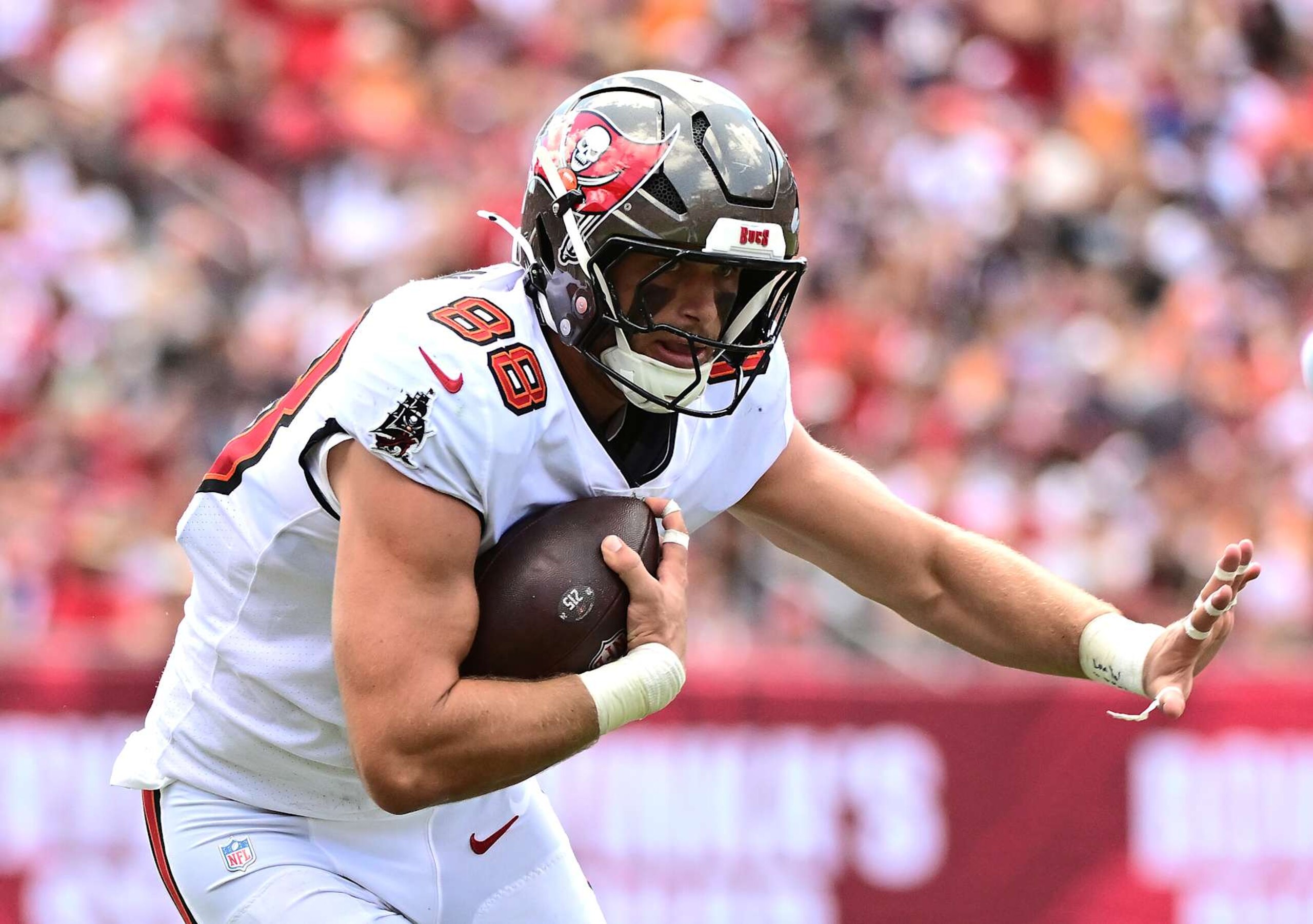 TAMPA, FLORIDA - SEPTEMBER 22: Cade Otton #88 of the Tampa Bay Buccaneers carries the ball against the Denver Broncos \d1h at Raymond James Stadium on September 22, 2024 in Tampa, Florida. (Photo by Julio Aguilar/Getty Images) TAMPA, FLORIDA - SEPTEMBER 22: Cade Otton #88 of the Tampa Bay Buccaneers carries the ball against the Denver Broncos \d1h at Raymond James Stadium on September 22, 2024 in Tampa, Florida. (Photo by Julio Aguilar/Getty Images)