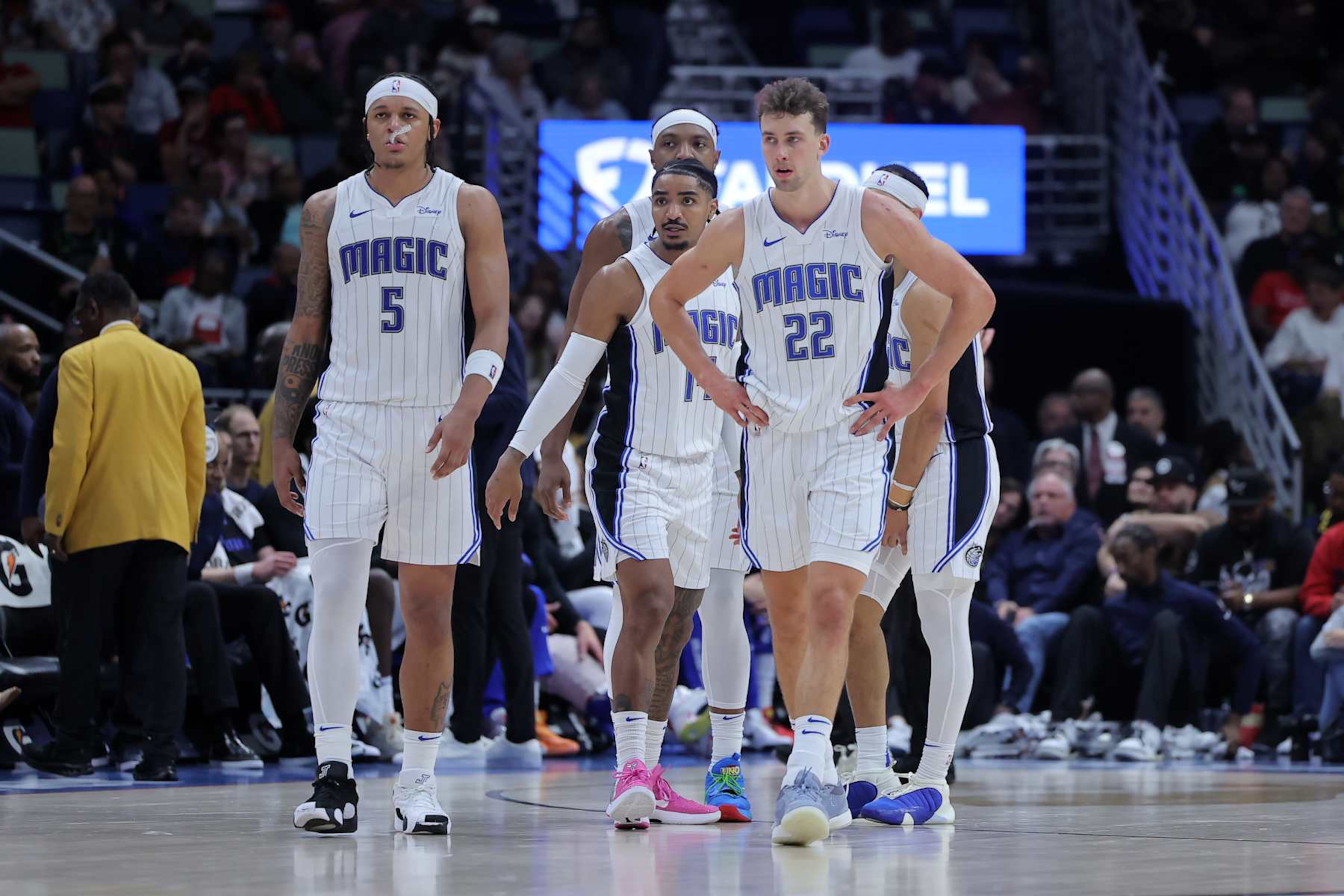NEW ORLEANS, LOUISIANA - APRIL 03: Paolo Banchero #5, Franz Wagner #22 and Gary Harris #14 of the Orlando Magic react during a game against the New Orleans Pelicans at the Smoothie King Center on April 03, 2024 in New Orleans, Louisiana. NOTE TO USER: User expressly acknowledges and agrees that, by downloading and or using this Photograph, user is consenting to the terms and conditions of the Getty Images License Agreement. (Photo by Jonathan Bachman/Getty Images) NEW ORLEANS, LOUISIANA - APRIL 03: Paolo Banchero #5, Franz Wagner #22 and Gary Harris #14 of the Orlando Magic react during a game against the New Orleans Pelicans at the Smoothie King Center on April 03, 2024 in New Orleans, Louisiana. NOTE TO USER: User expressly acknowledges and agrees that, by downloading and or using this Photograph, user is consenting to the terms and conditions of the Getty Images License Agreement. (Photo by Jonathan Bachman/Getty Images)