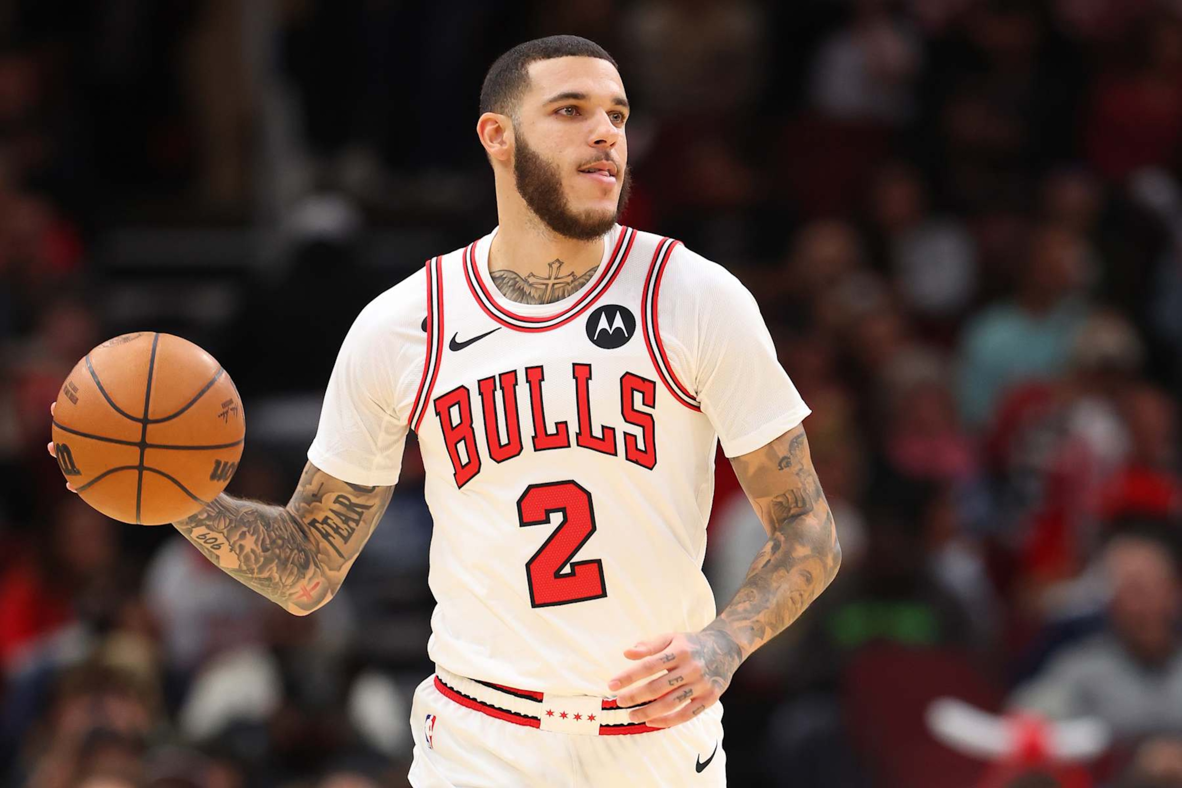 CHICAGO, ILLINOIS - OCTOBER 16: Lonzo Ball #2 of the Chicago Bulls dribbles up the court against the Minnesota Timberwolves during the first half of a preseason game at the United Center on October 16, 2024 in Chicago, Illinois. NOTE TO USER: User expressly acknowledges and agrees that, by downloading and or using this photograph, User is consenting to the terms and conditions of the Getty Images License Agreement. (Photo by Michael Reaves/Getty Images) CHICAGO, ILLINOIS - OCTOBER 16: Lonzo Ball #2 of the Chicago Bulls dribbles up the court against the Minnesota Timberwolves during the first half of a preseason game at the United Center on October 16, 2024 in Chicago, Illinois. NOTE TO USER: User expressly acknowledges and agrees that, by downloading and or using this photograph, User is consenting to the terms and conditions of the Getty Images License Agreement. (Photo by Michael Reaves/Getty Images)